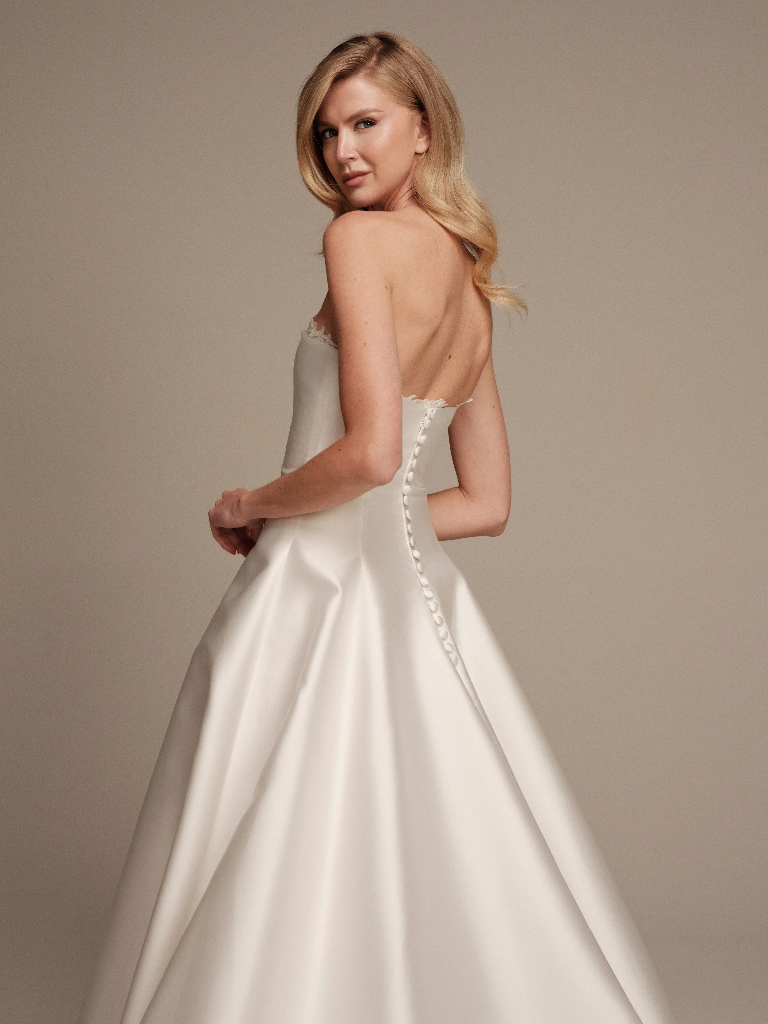 Vesta silk mikado wedding dress with covered buttons and elegant back detail