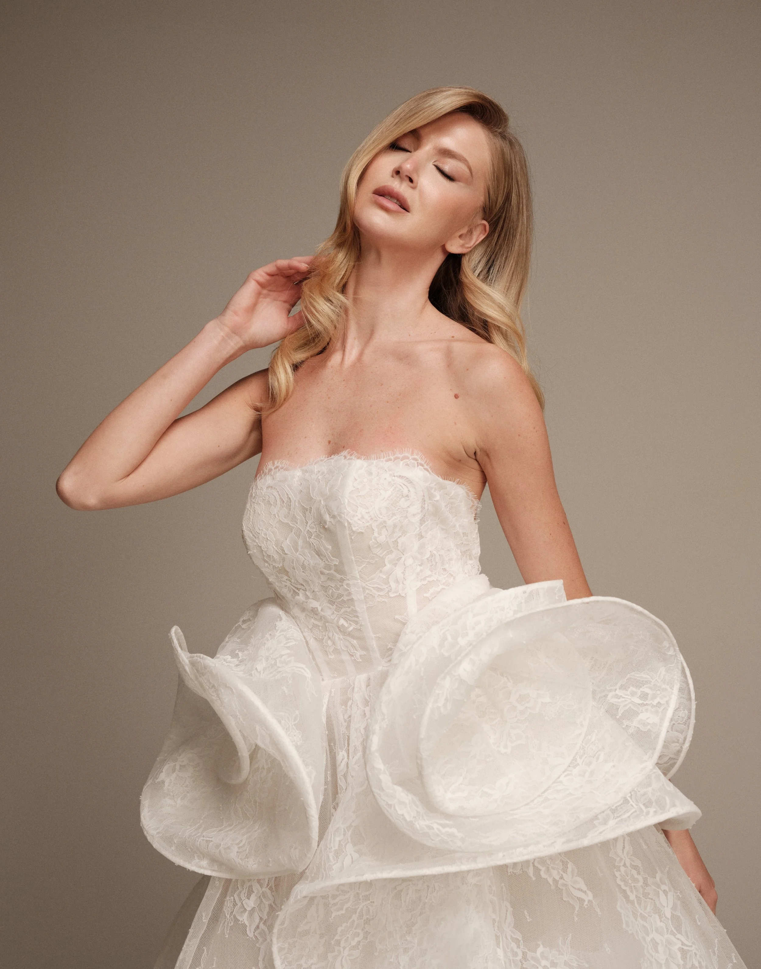 Ceres strapless wedding dress with intricate Chantilly lace bodice