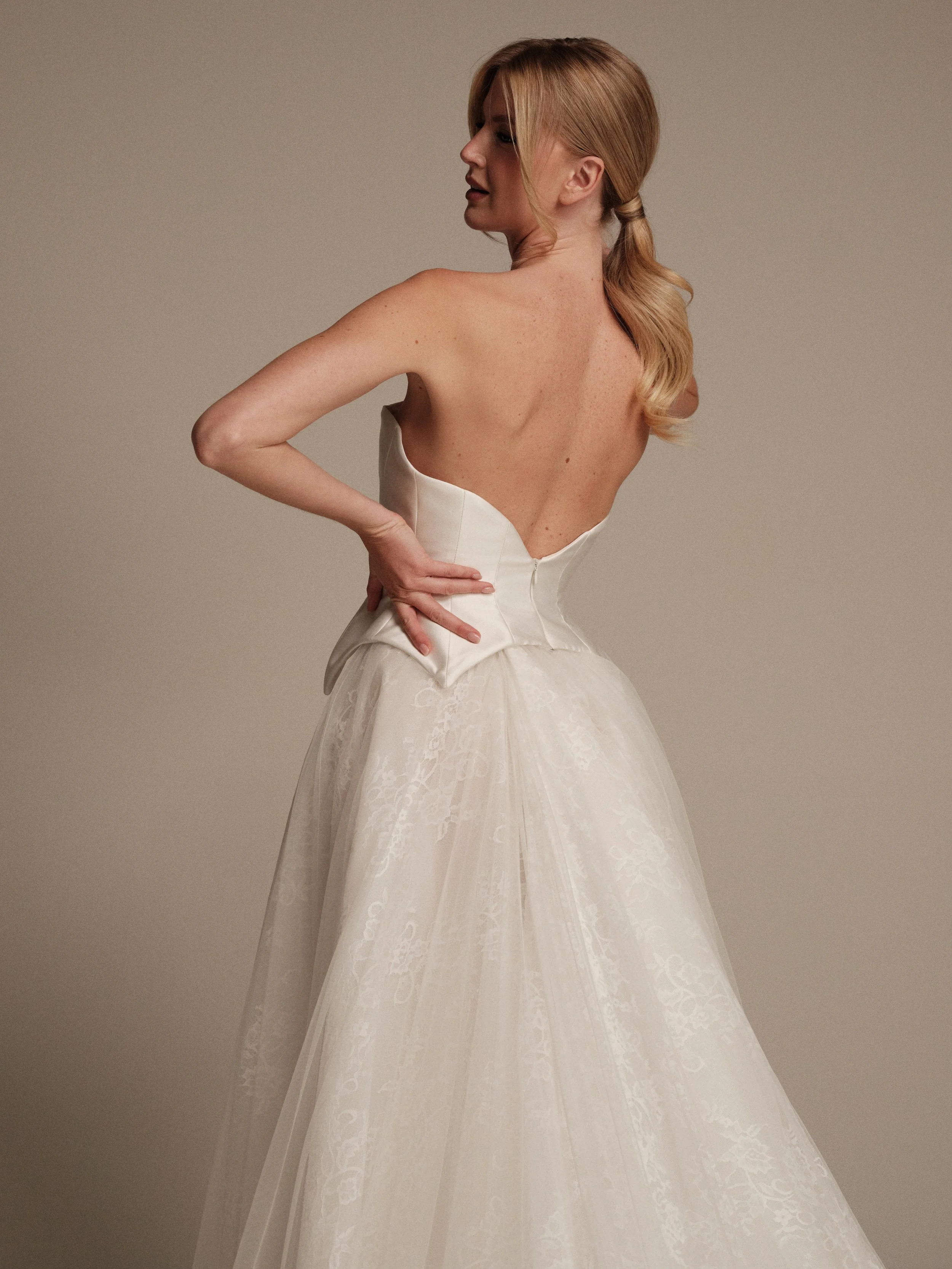 Gaia by Maria Pia two-piece wedding dress with strapless sculpted silk mikado peplum bodice
