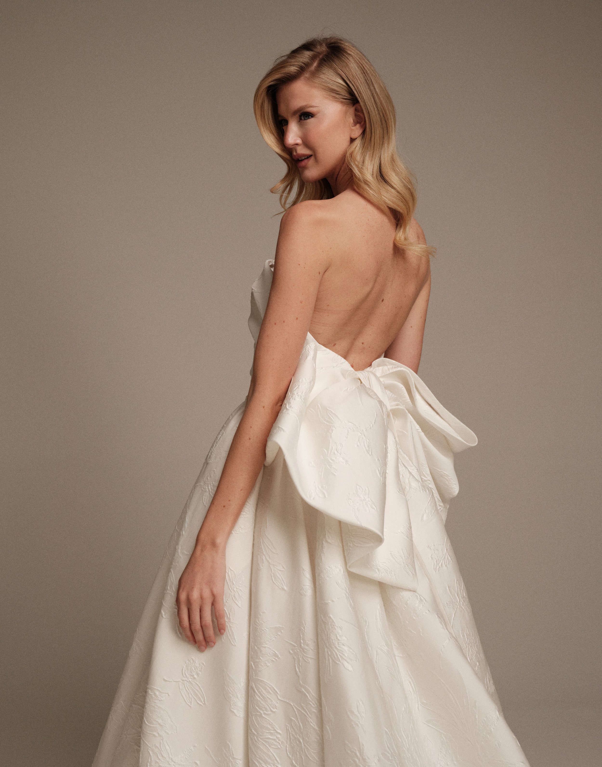 Maria Pia Arianna wedding dress with oversized sculptural back bow