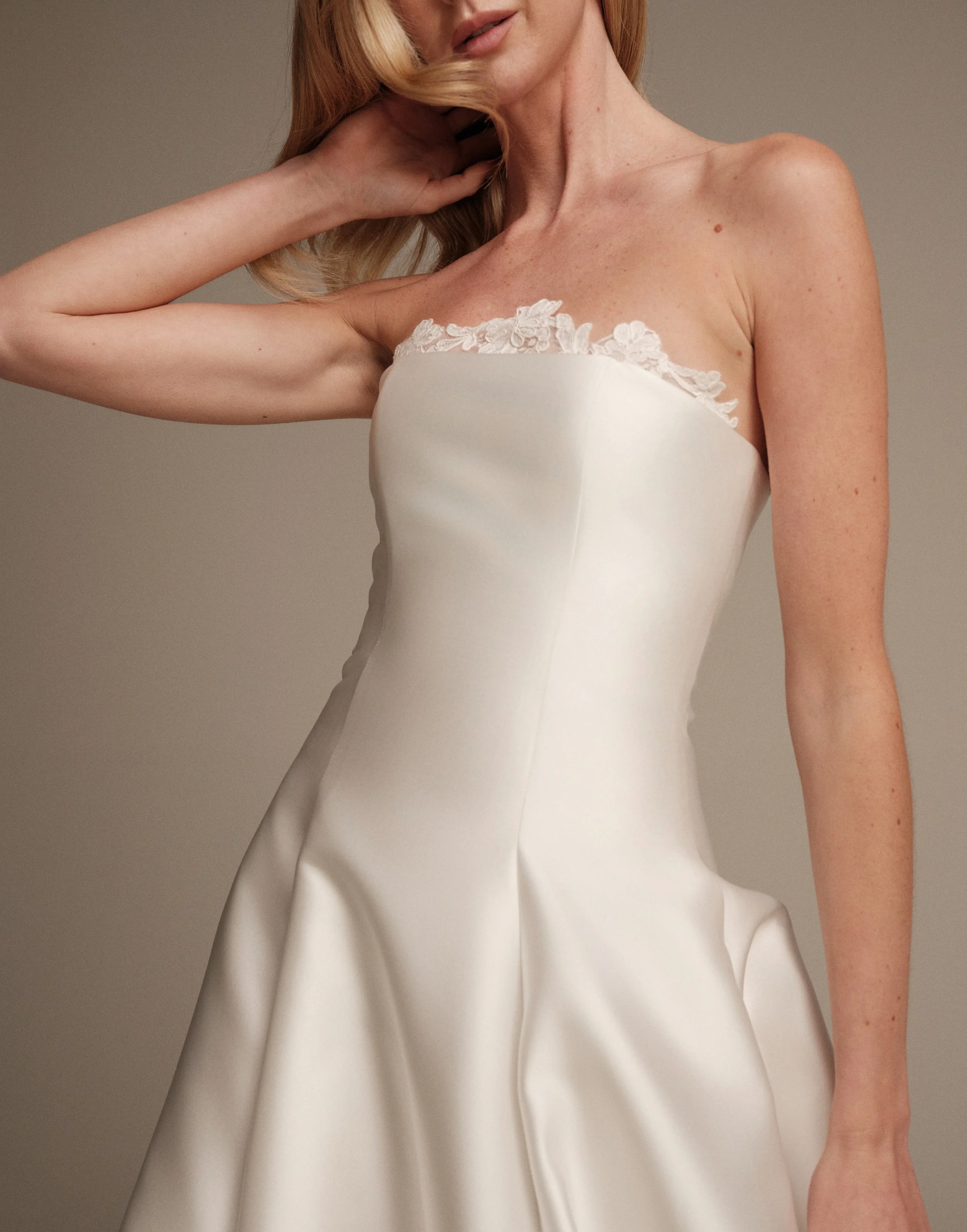 French lace detail on the strapless neckline of the Vesta wedding dress