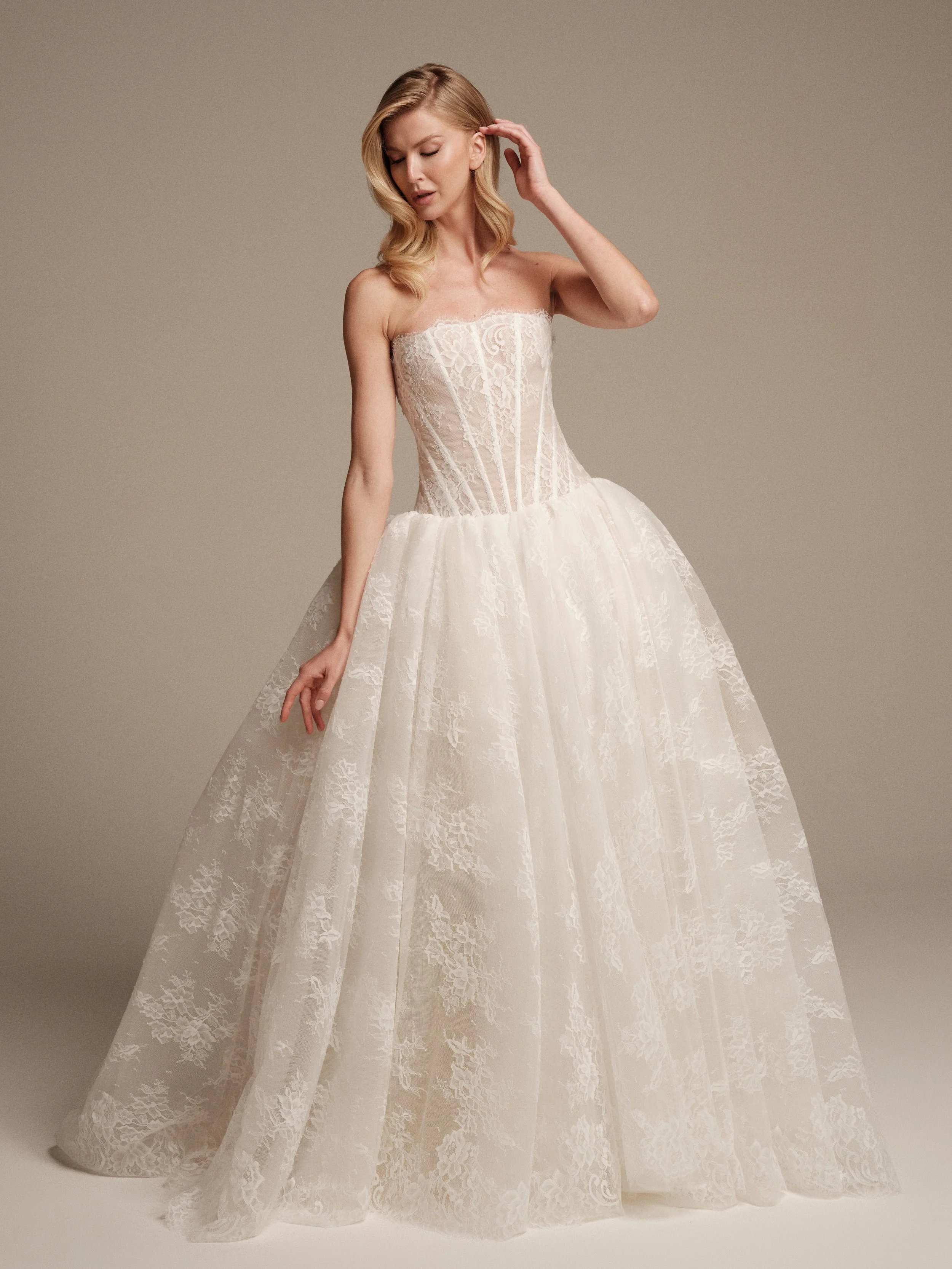 Maria Pia Venus strapless Chantilly lace ball gown with sculpted drop waist