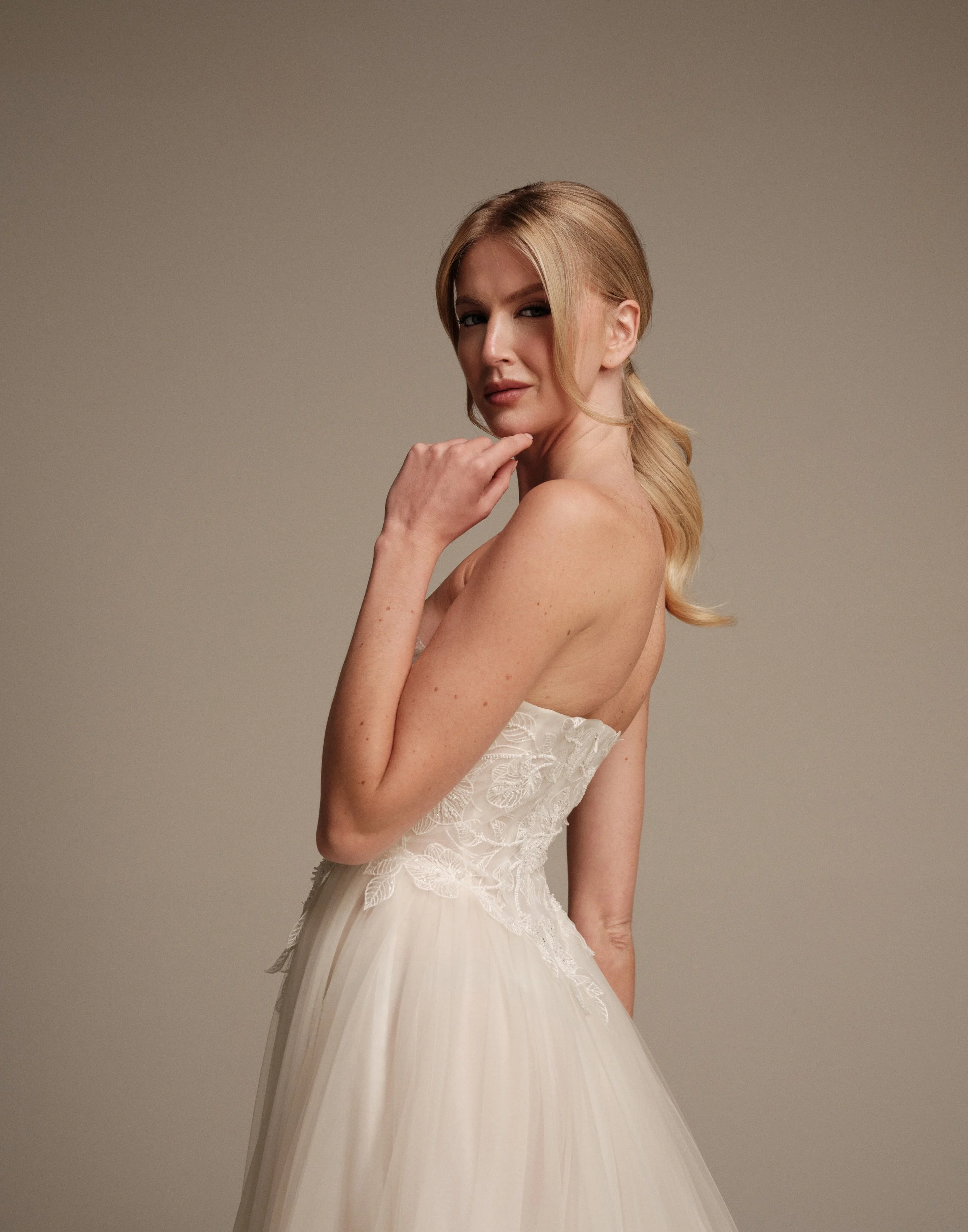 Luna wedding dress showing detailed beaded embroidery on the back bodice by Maria Pia Bridal