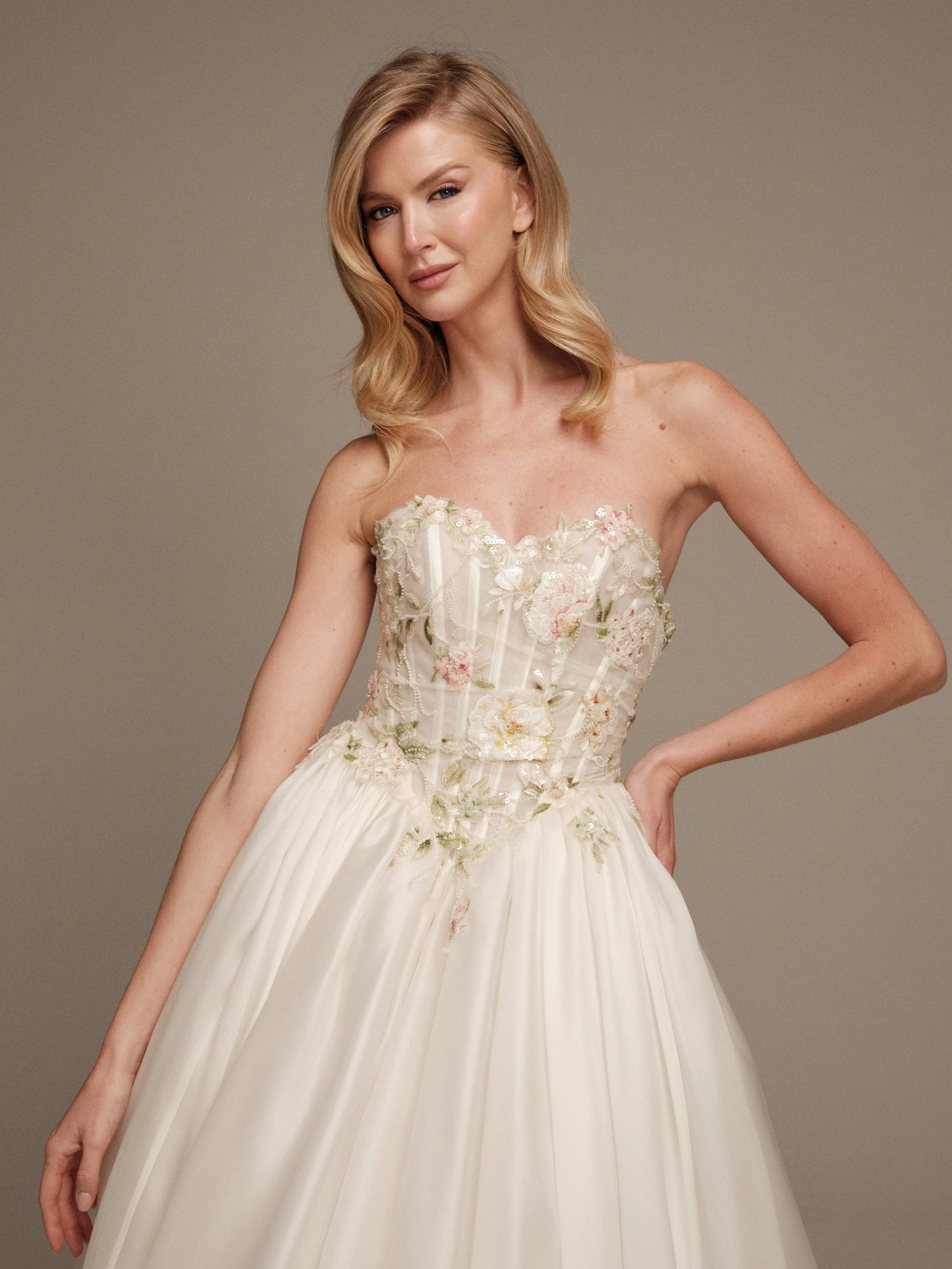 Flora bridal gown with pink and green floral embroidery and delicate beading