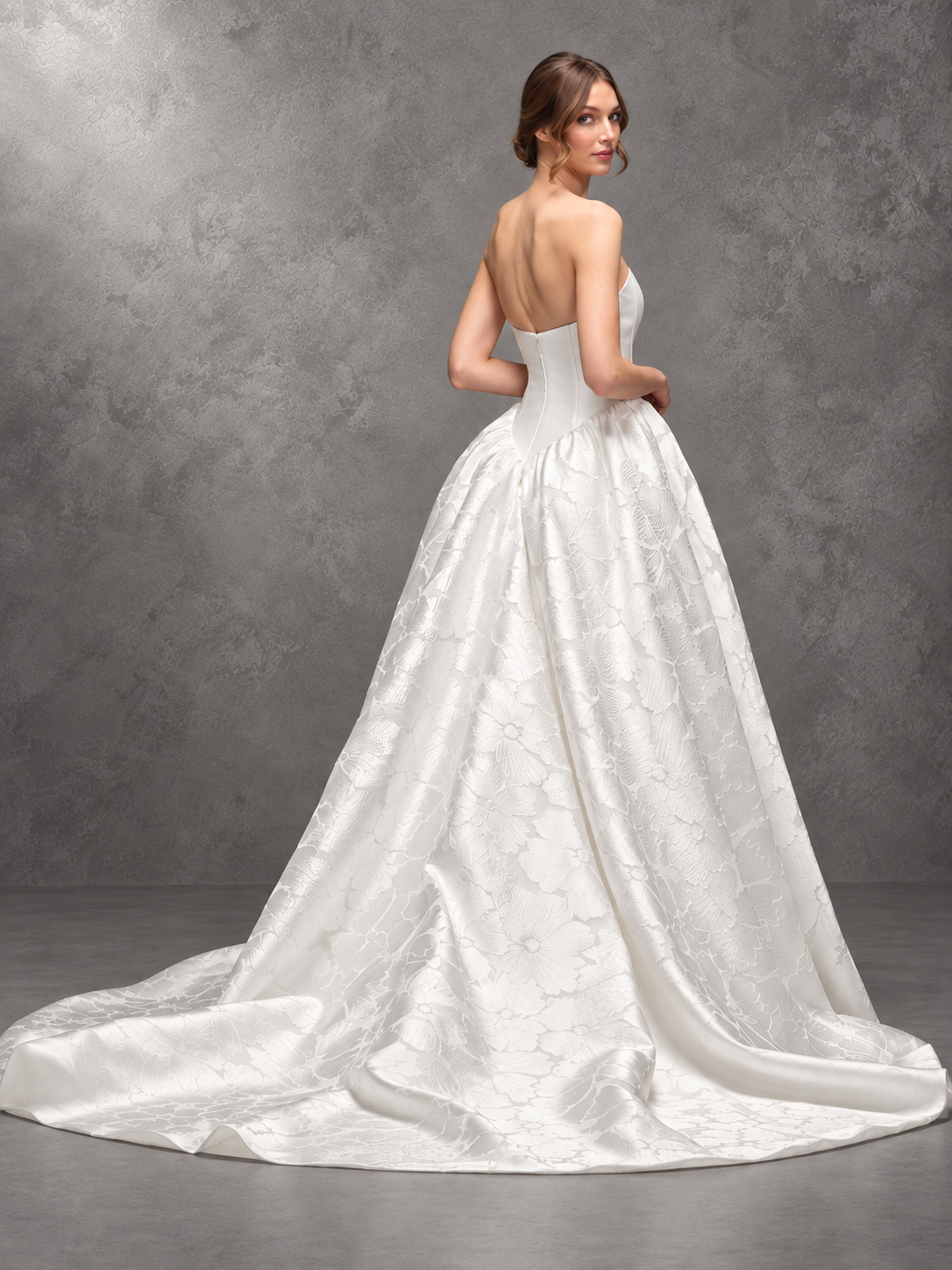 Maria Pia Ilenia wedding dress with structured strapless bodice and sculptural floral jacquard skirt