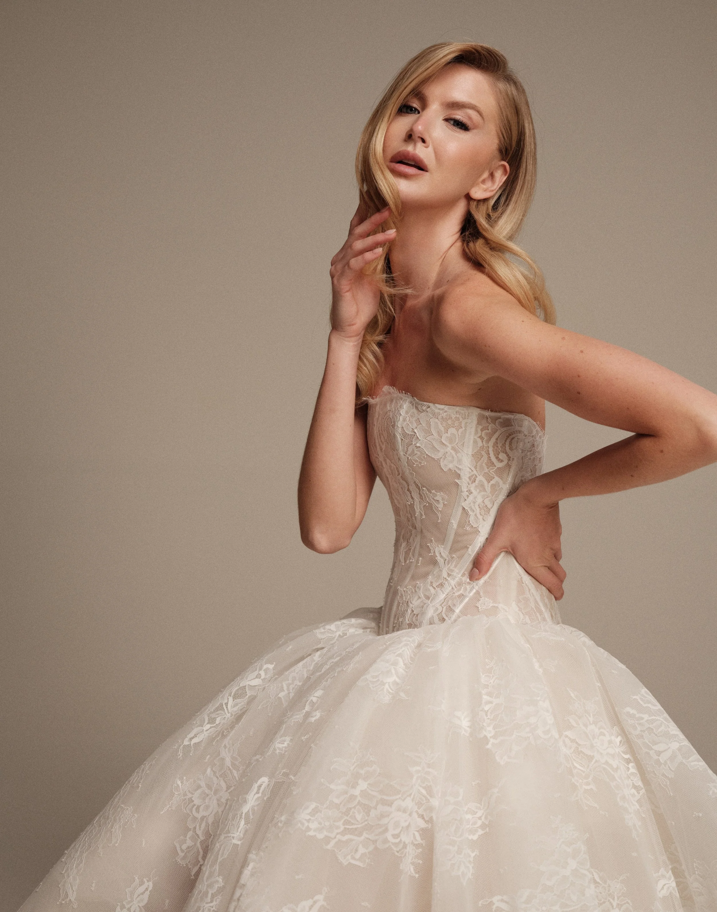 Venus strapless Chantilly lace wedding dress with fitted corset bodice by Maria Pia