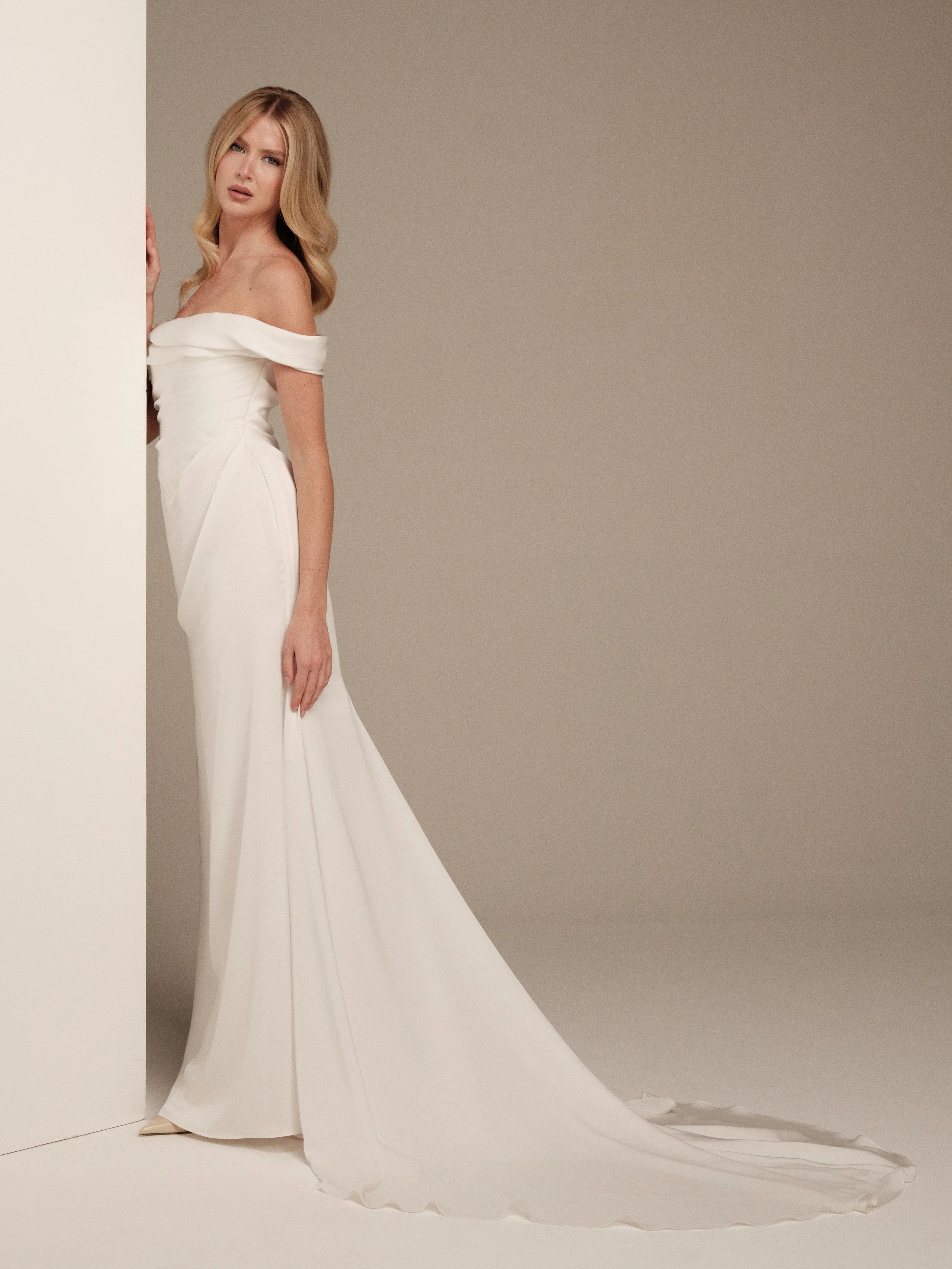 Maria Pia Eos satin bridal gown with sculpted waist and fitted silhouette