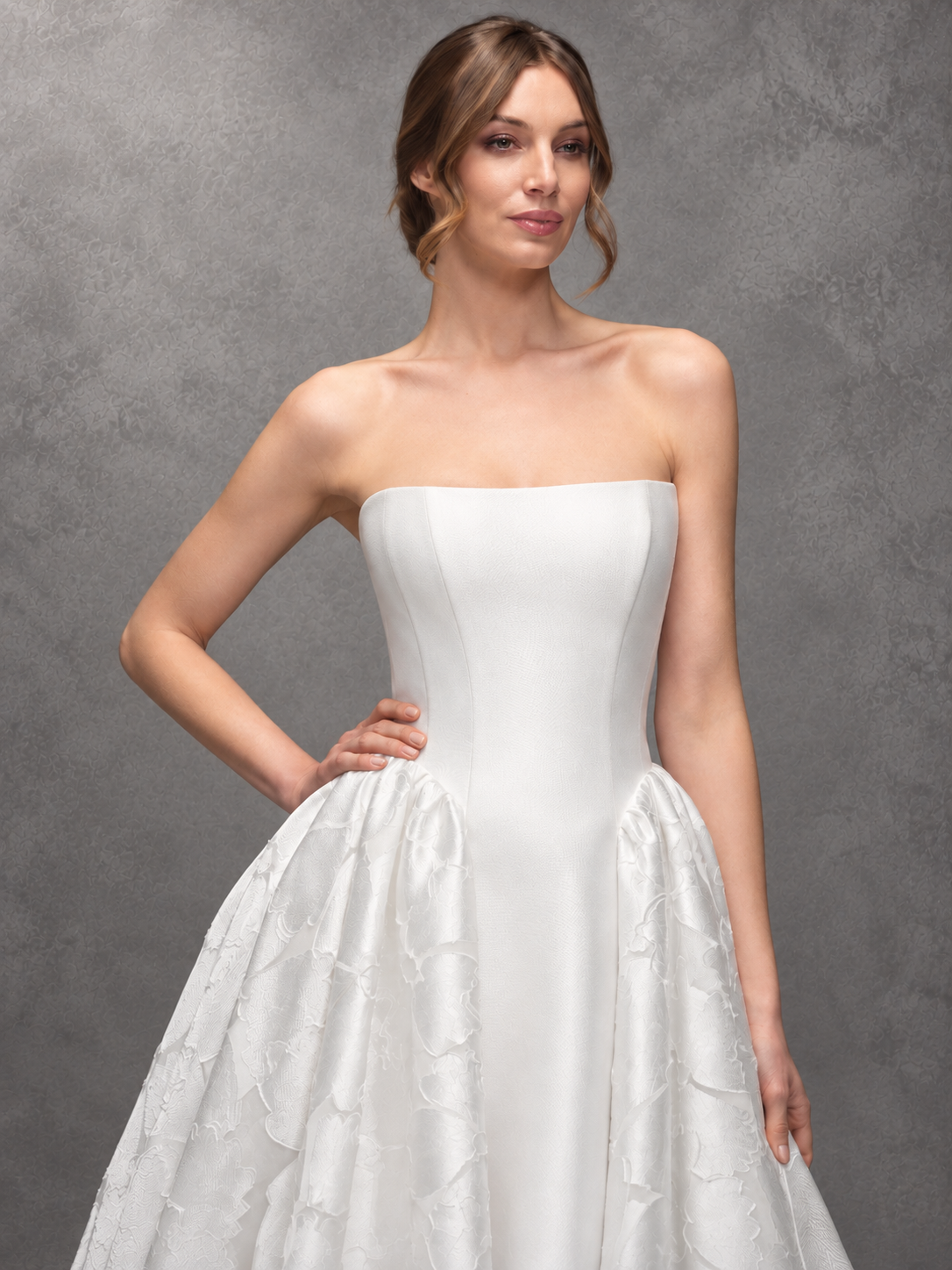 Maria Pia Ilenia wedding dress with structured strapless bodice and sculptural floral jacquard skirt