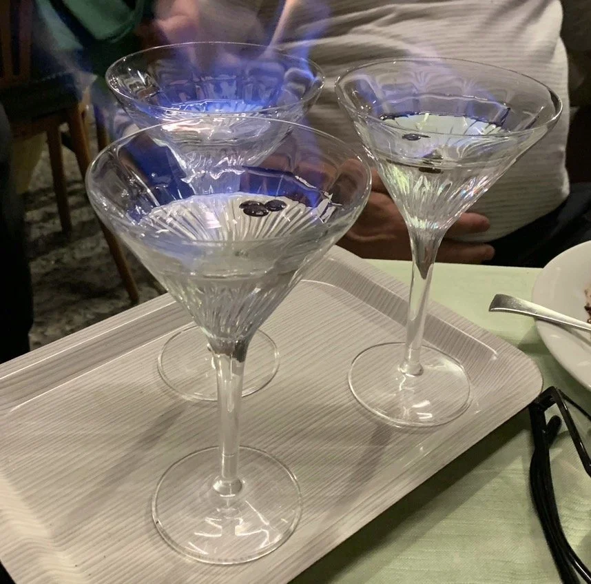Flaming Limoncello Spritz cocktails served at la Basilca restaurant in Sorrento, italy