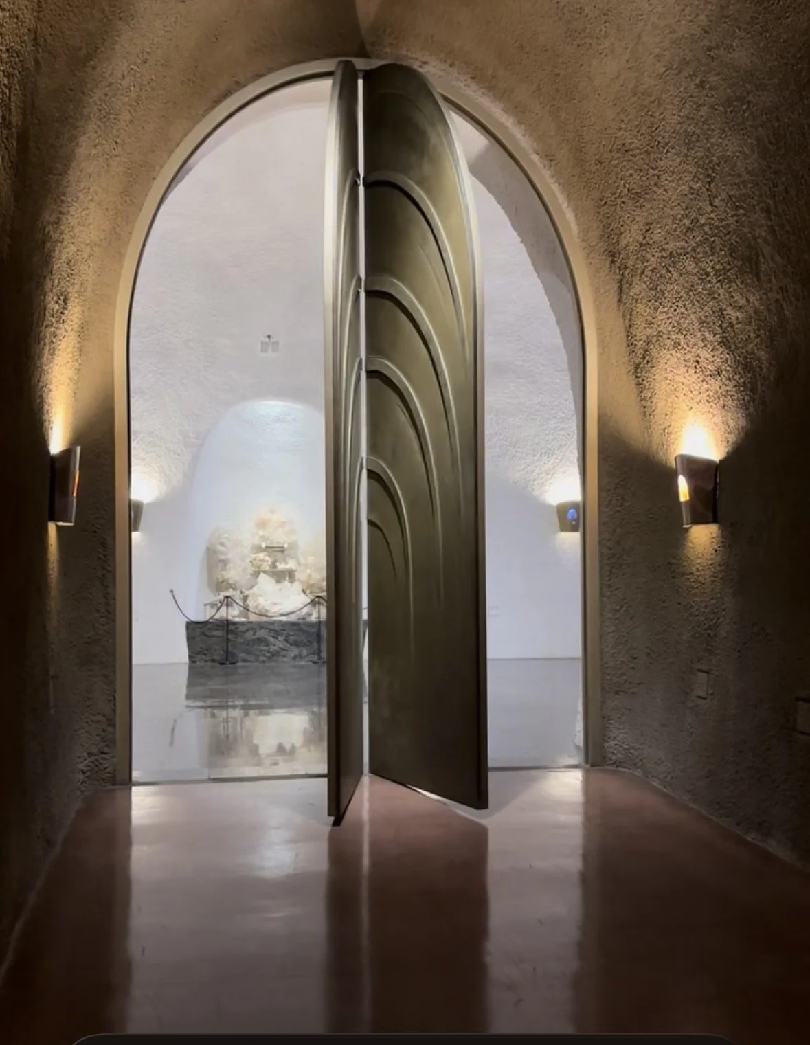 Large arched doorway inside the underground Jarvis Estate winery