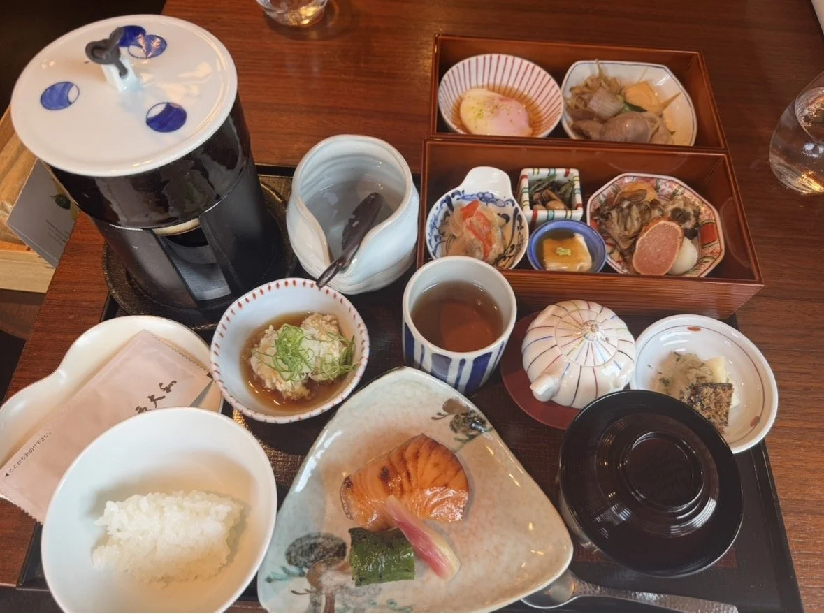 Traditional Japanese breakfast at Park Hyatt Kyoto featuring grilled fish, rice, miso soup and seasonal side dishes