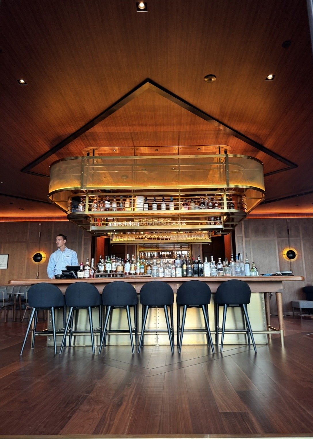 Captain’s Bar cocktail lounge inside Park Hyatt Auckland overlooking the harbor
