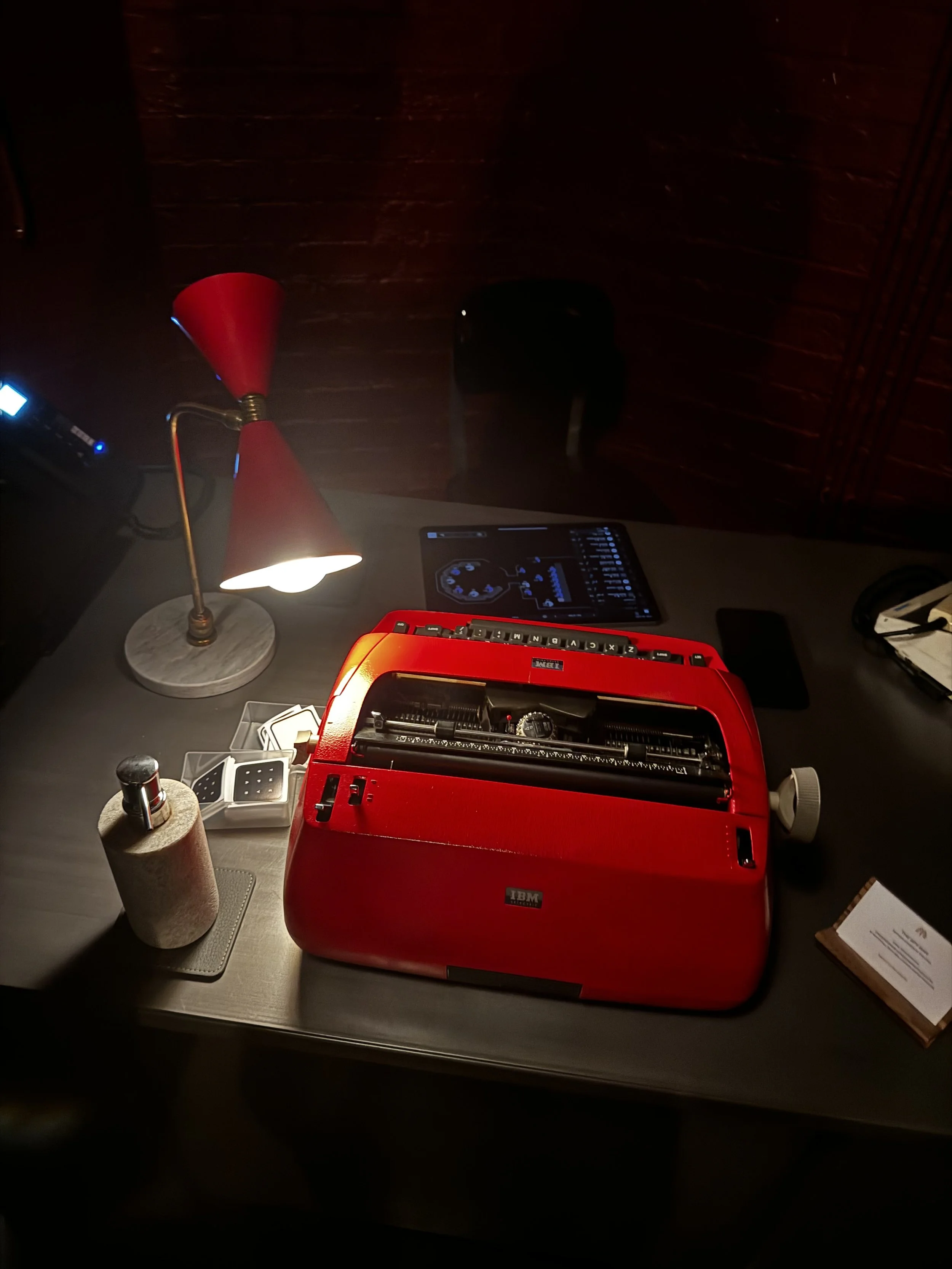 Spy Bar tasting experience display with a vintage typewriter at The OWO in London.
