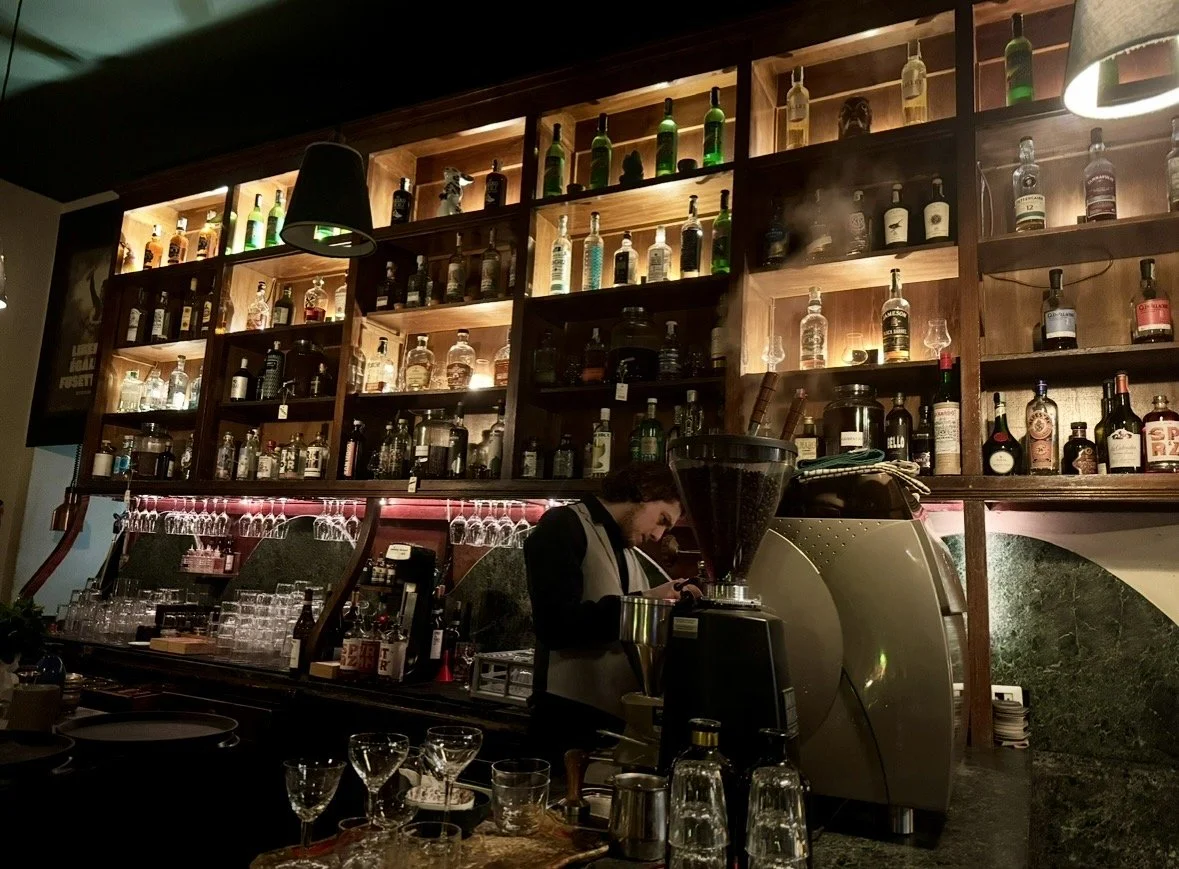 Bartender preparing cocktails inside Bar 1930 speakeasy Milan