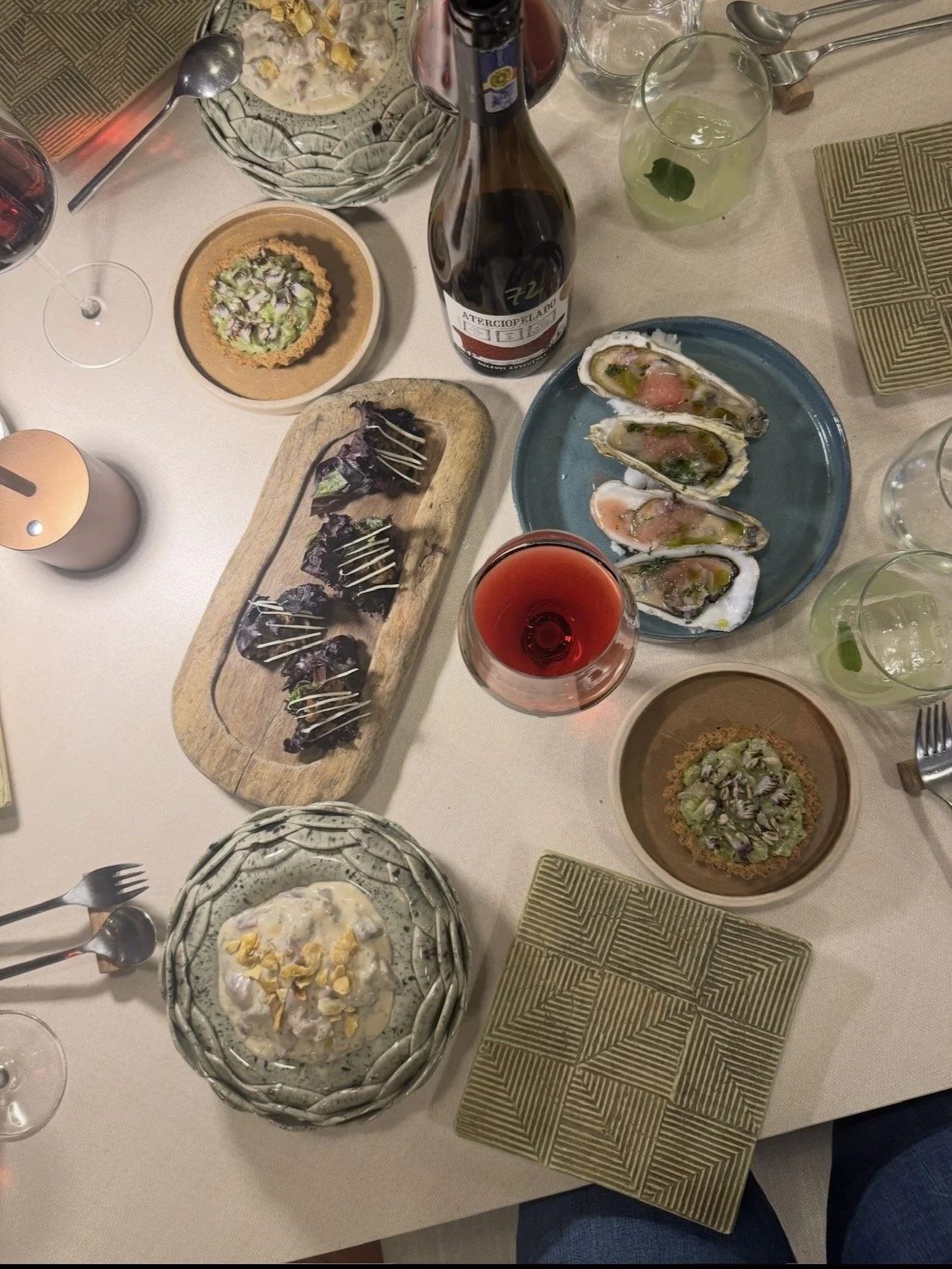 Seafood dishes and cocktails at Quitu restaurant in Quito