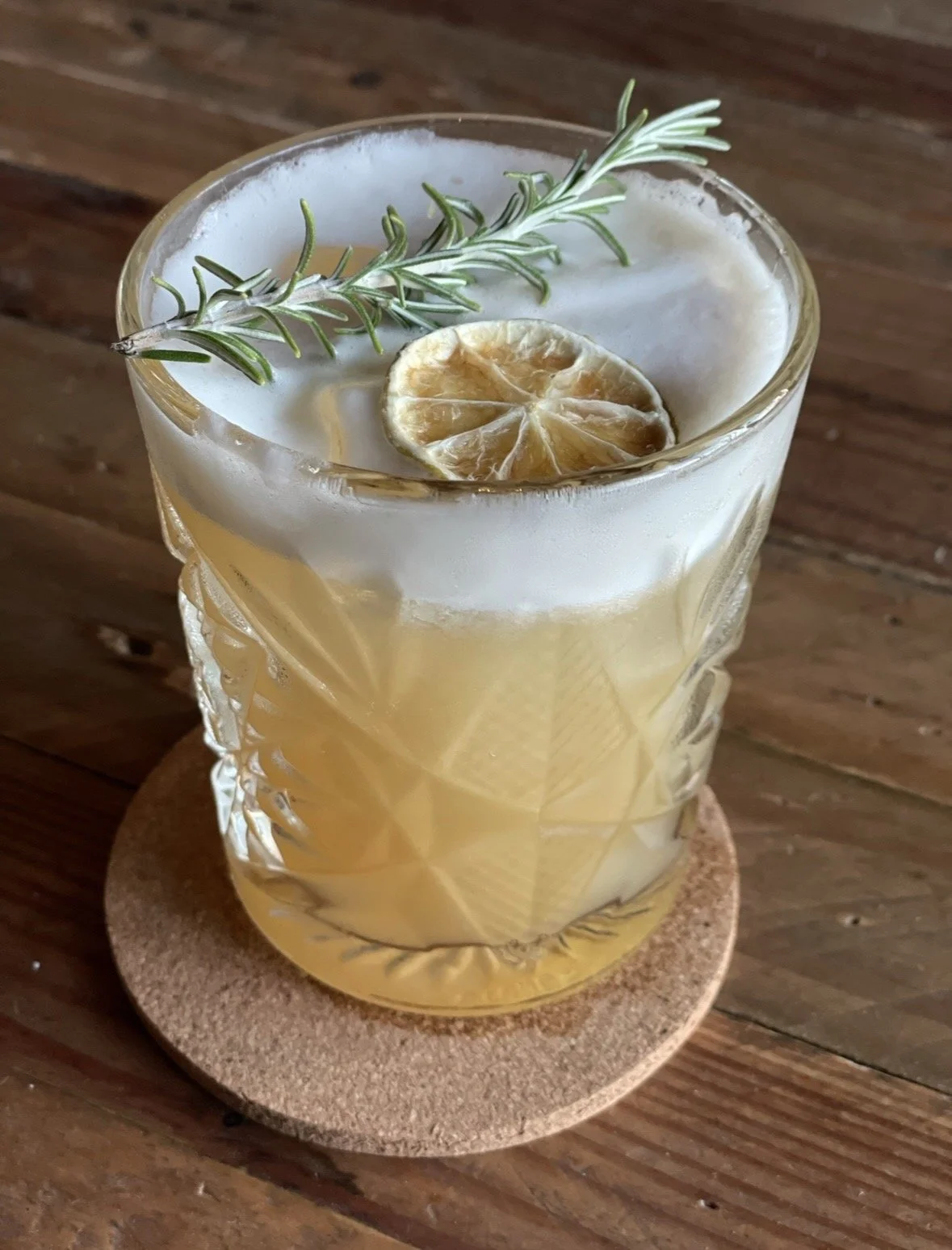 Handcrafted cocktail served at Six Senses Douro Valley overlooking Portugal's famous wine region.