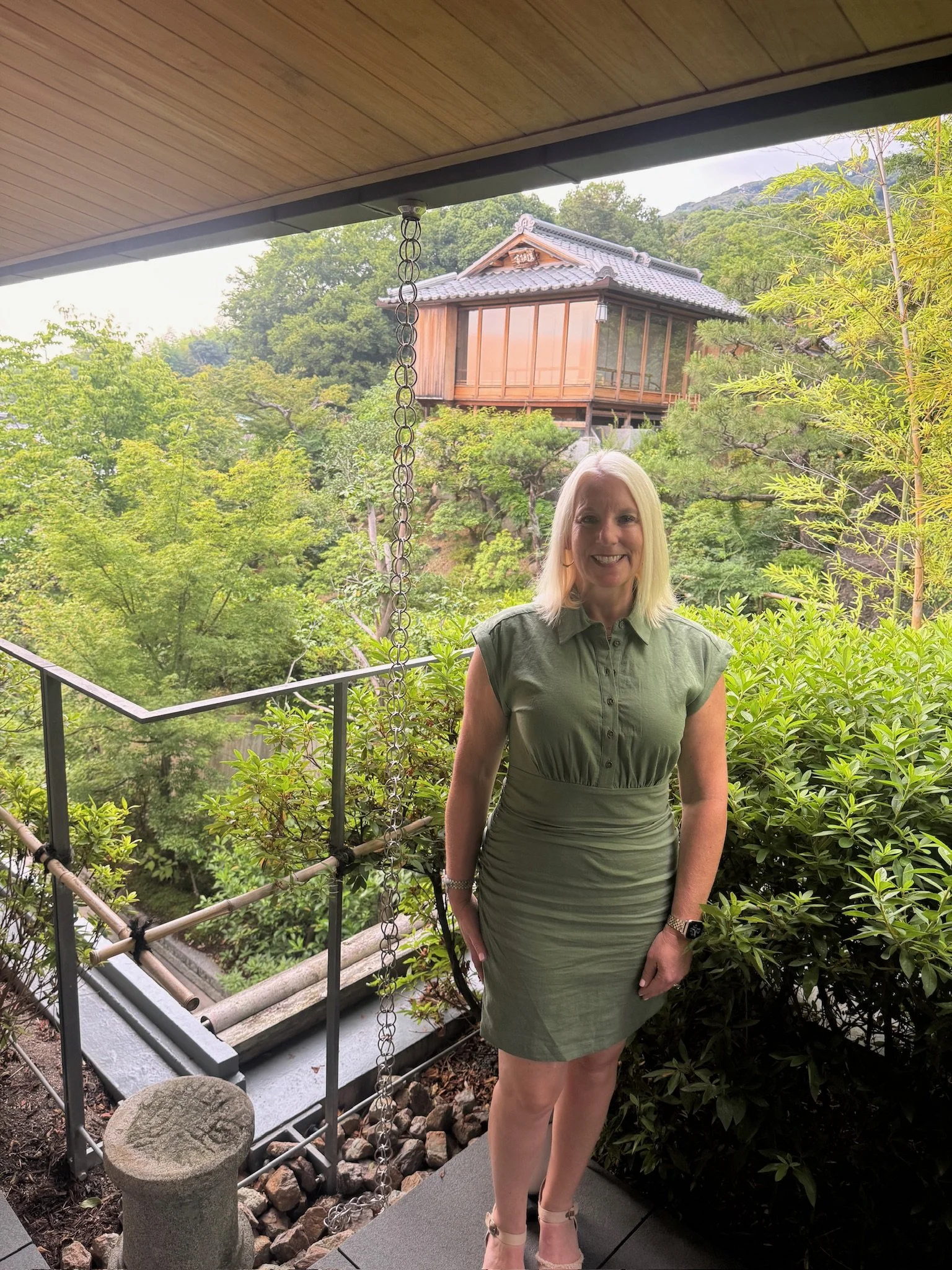 Garden view from a guest room terrace at Park Hyatt Kyoto overlooking traditional Kyoto architecture