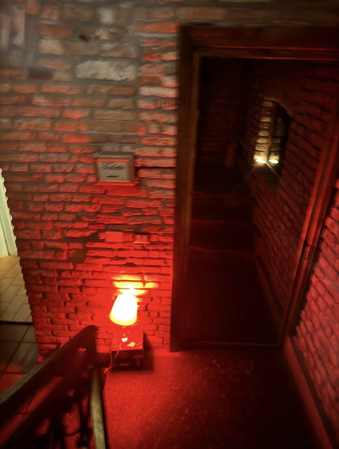 Hidden staircase entrance to Bar 1930 Milan speakeasy