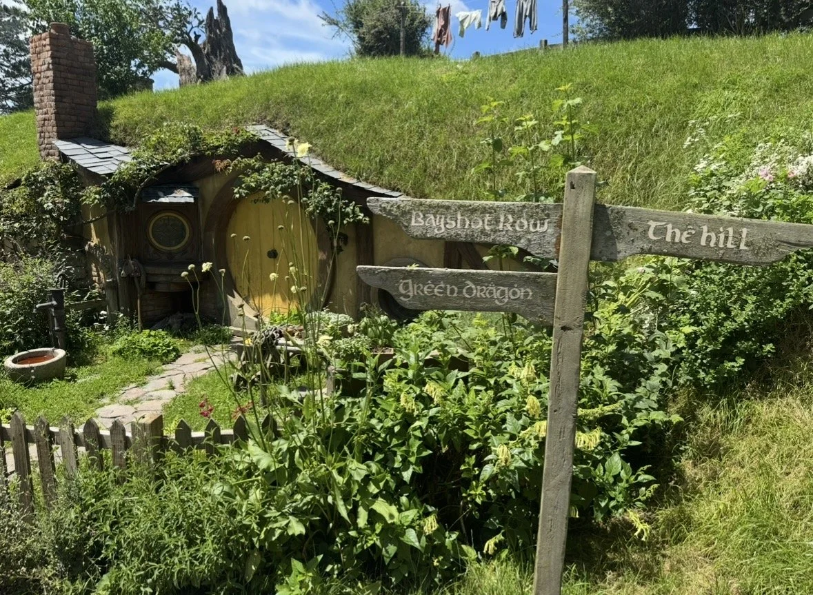 Bagshot Row and Green Dragon Inn sign at Hobbiton
