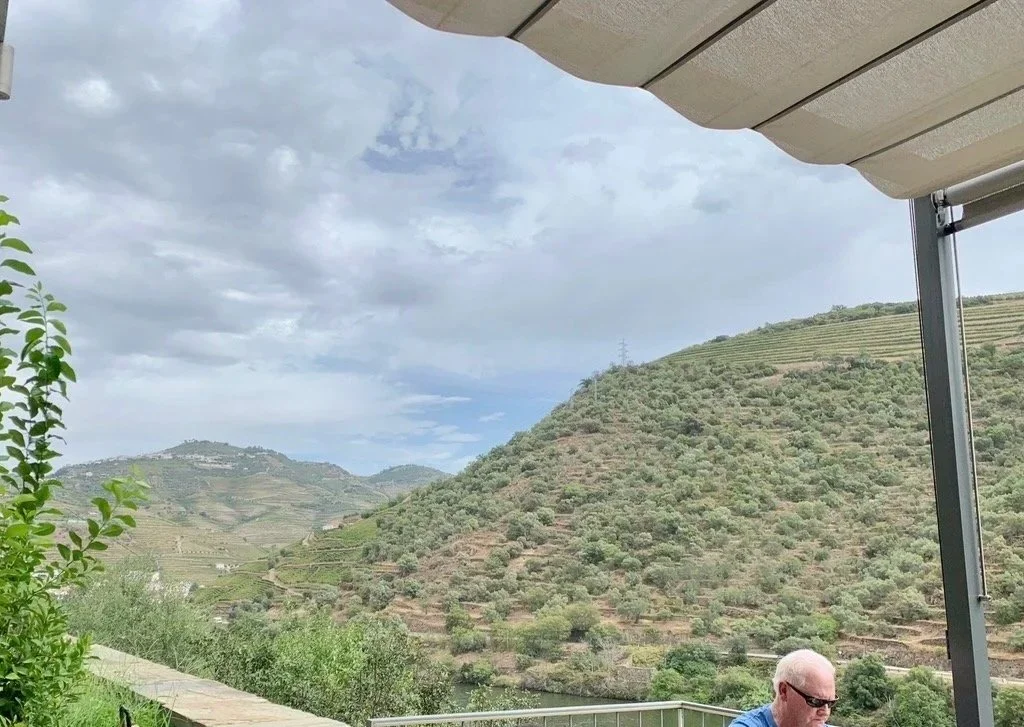 Terrace dining overlooking the Douro River at Quinta de La Rosa winery in Portugal.