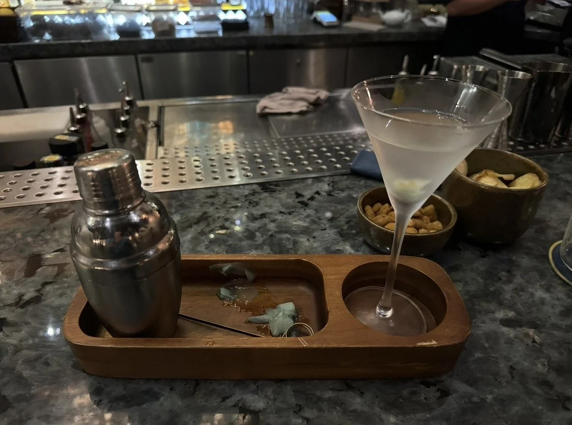Cocktail served with a miniature shaker at Bar Trigona in Kuala Lumpur