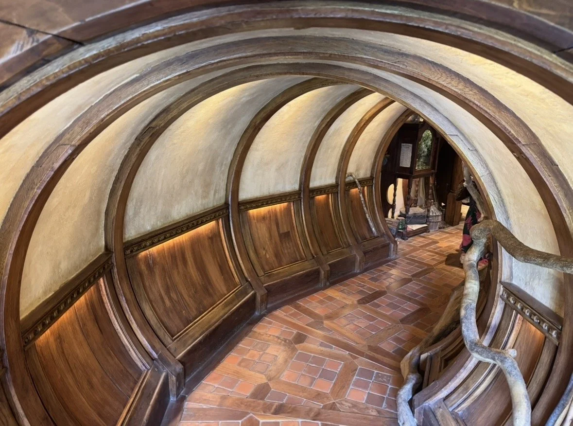 Hobbiton interior hobbit house hallway curved architecture