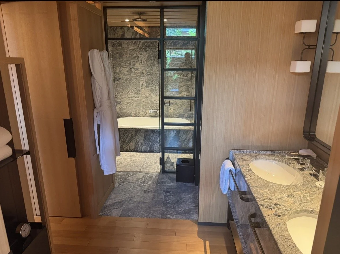 Park Hyatt Kyoto bathroom with modern Japanese design, deep soaking tub and stone finishes