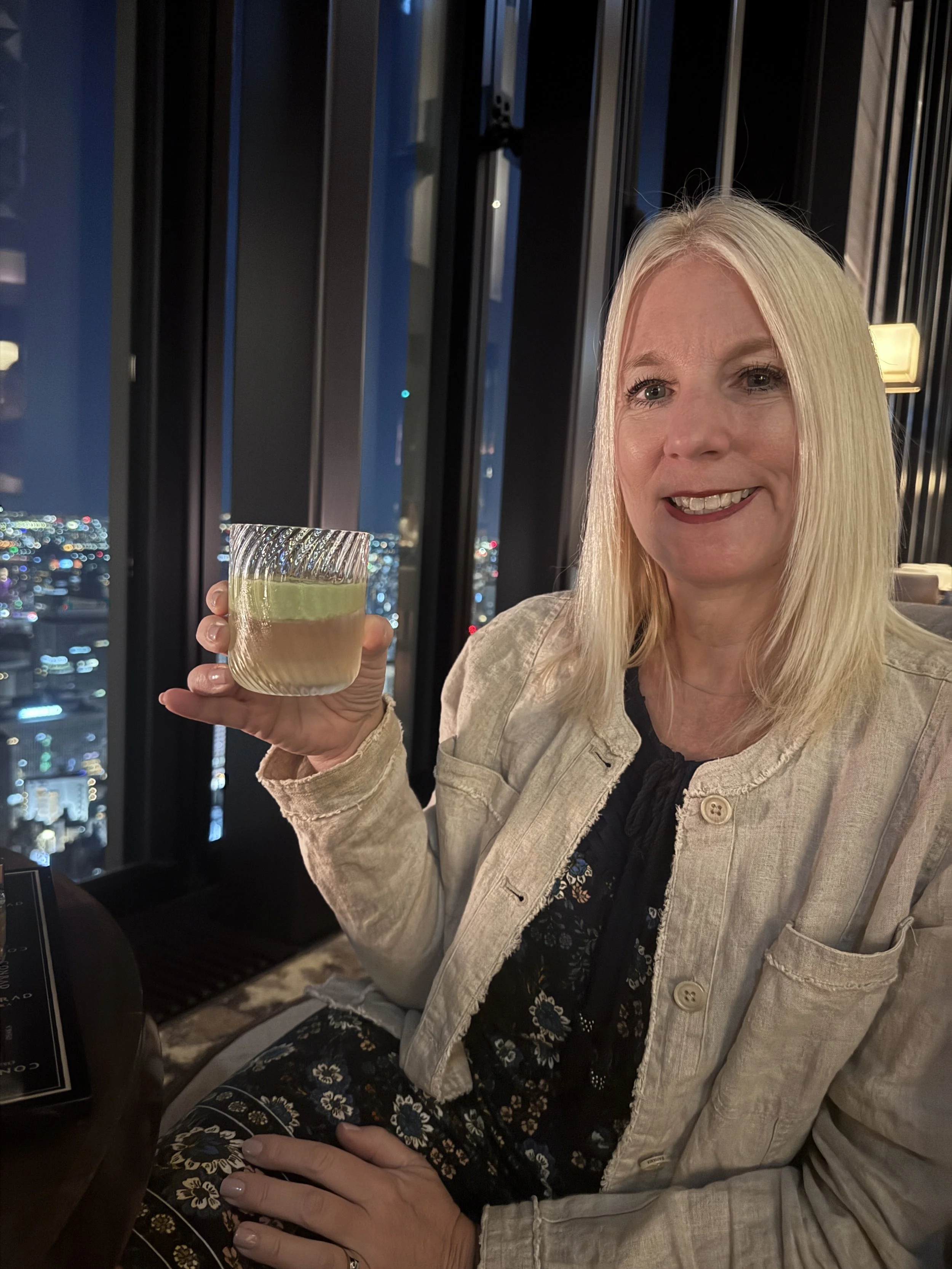 Enjoying cocktails with skyline views at Conrad Osaka