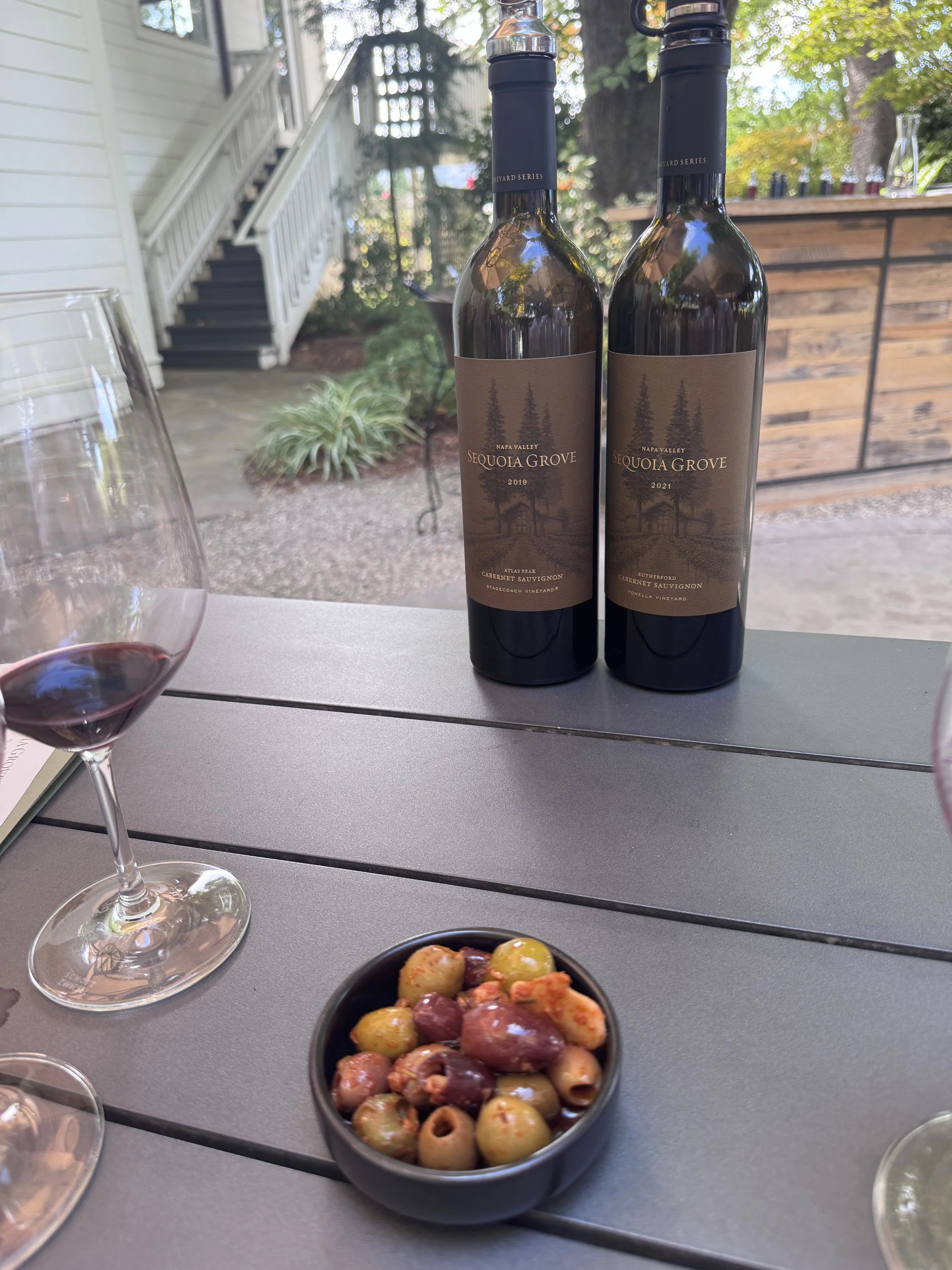 Sequoia Grove Stagecoach Vineyard and Tonella Vineyard Cabernet Sauvignon bottles during a wine tasting in Rutherford, Napa Valley.