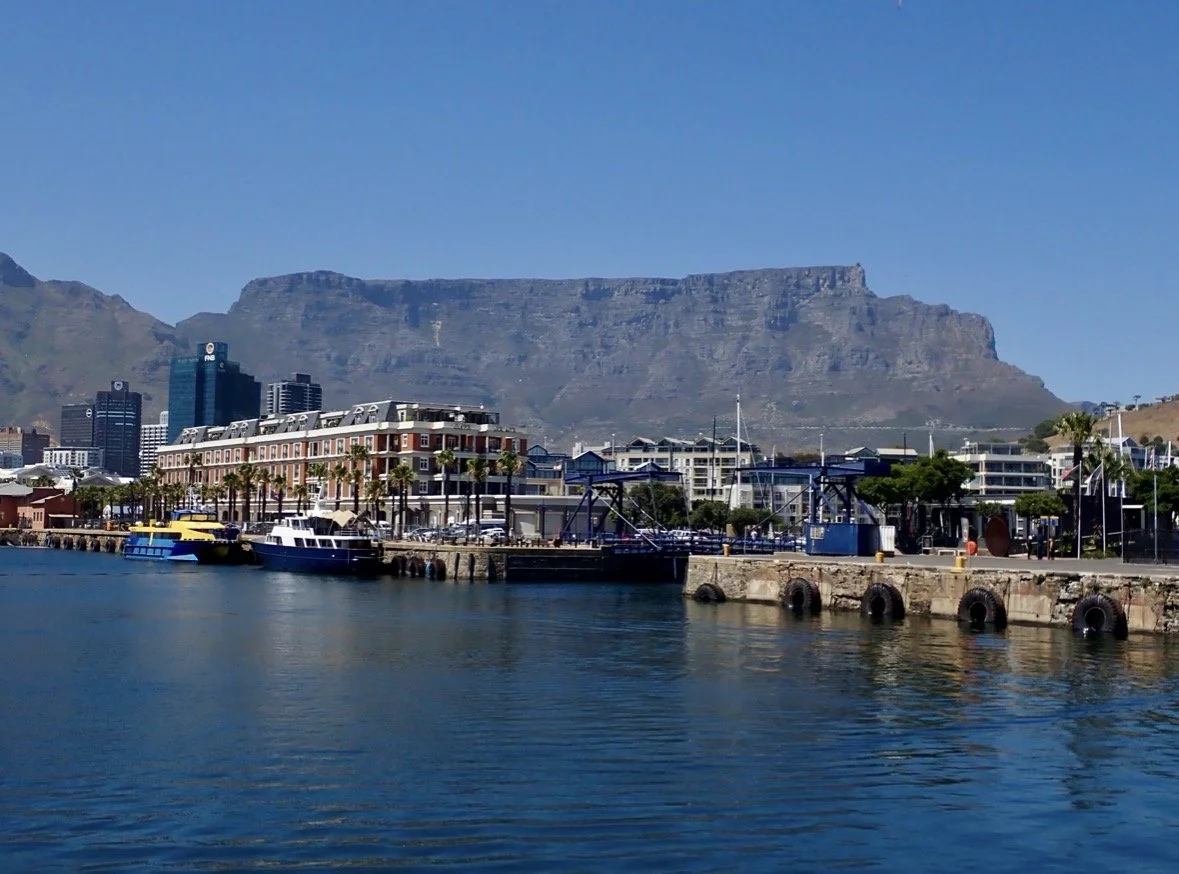 Table Mountain rising behind the V&A Waterfront in Cape Town, South Africa