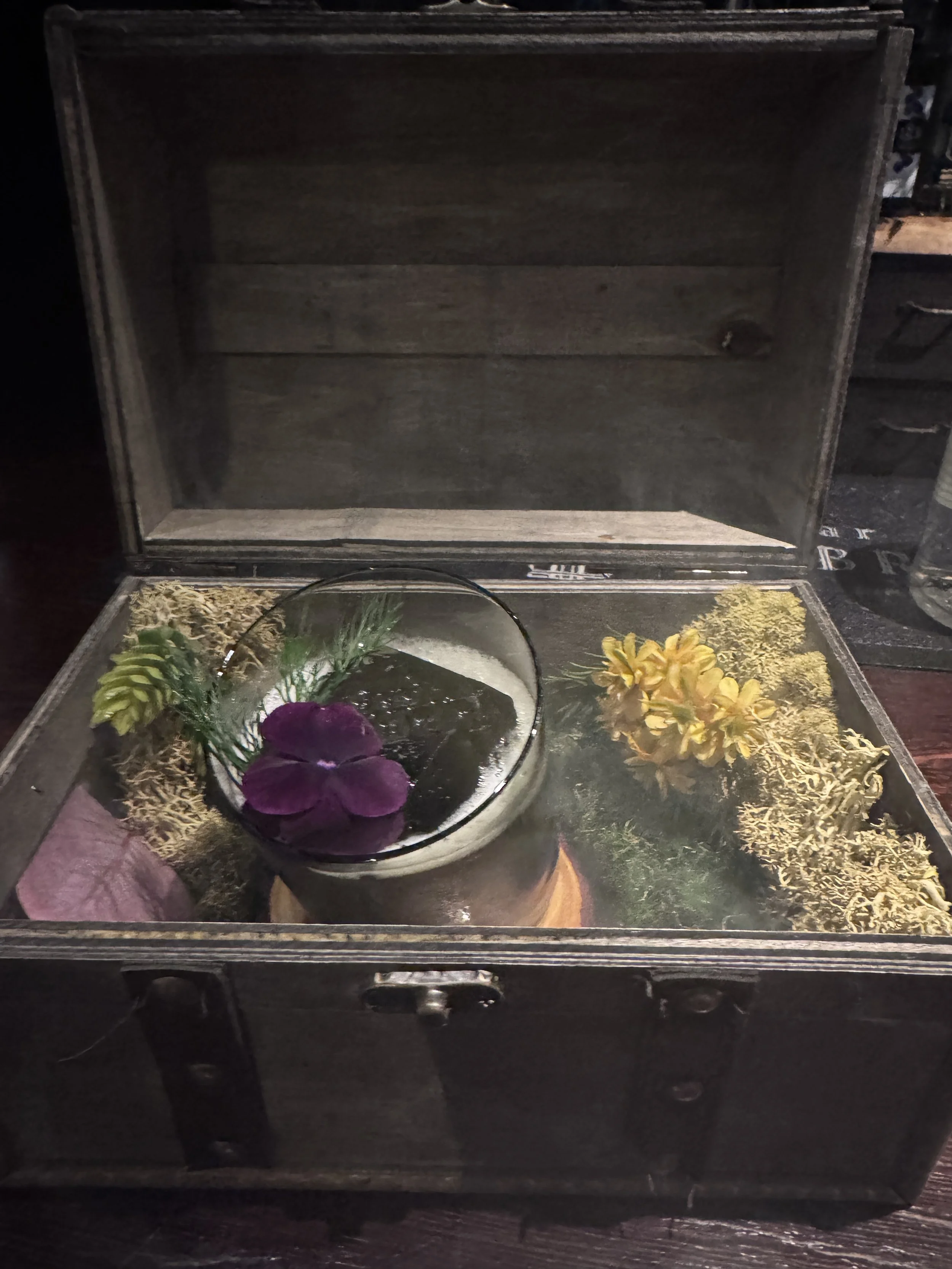 Signature treasure chest cocktail presentation at Bar Libre Tokyo