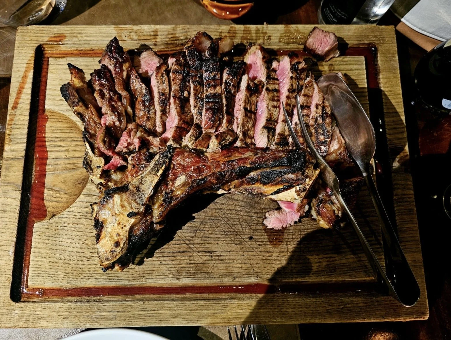 Traditional Bistecca alla Fiorentina served at L'Ortone restaurant in Florence