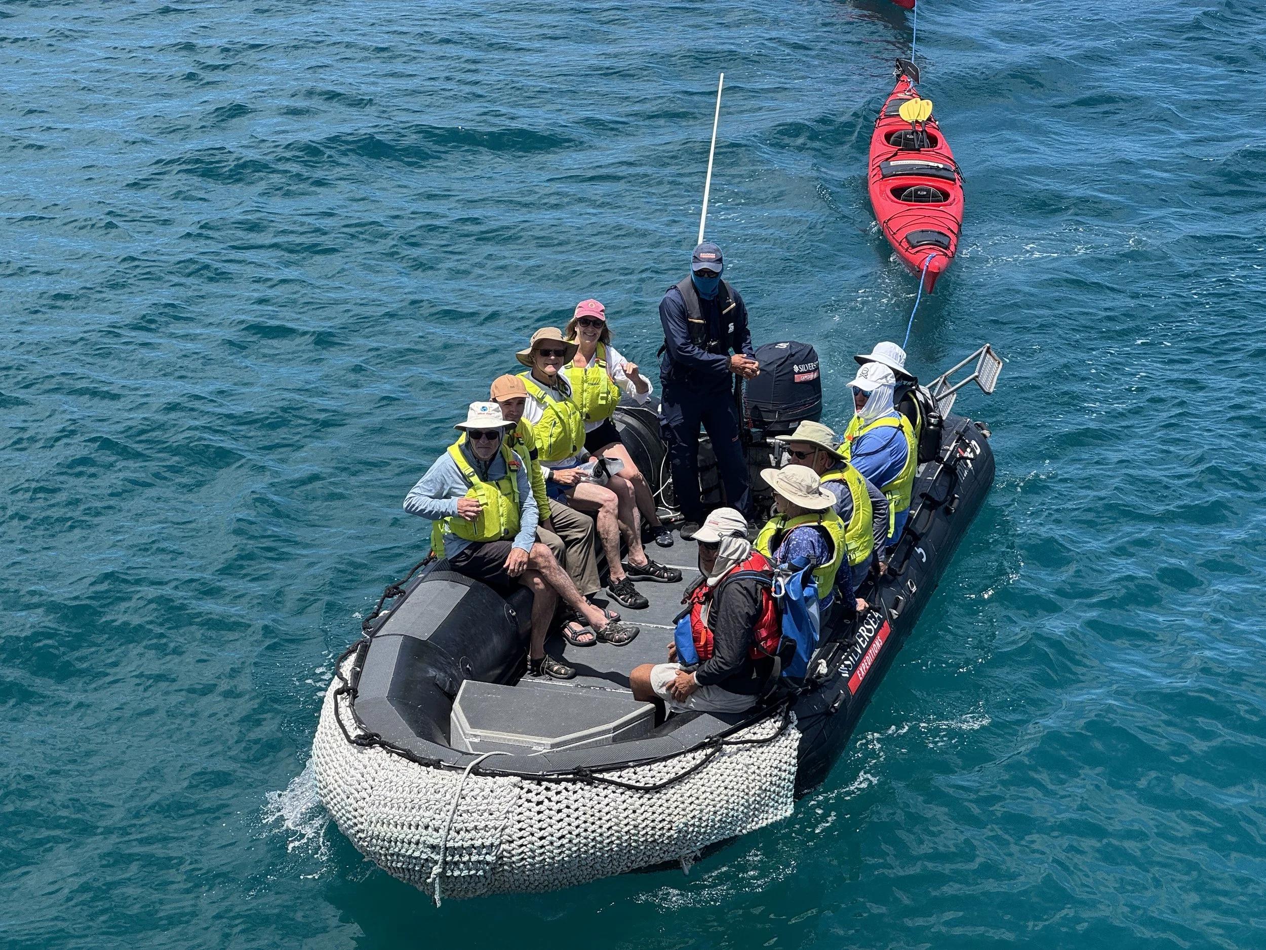 Silversea Silver Origin Zodiac excursion exploring the Galápagos Islands' volcanic coastline