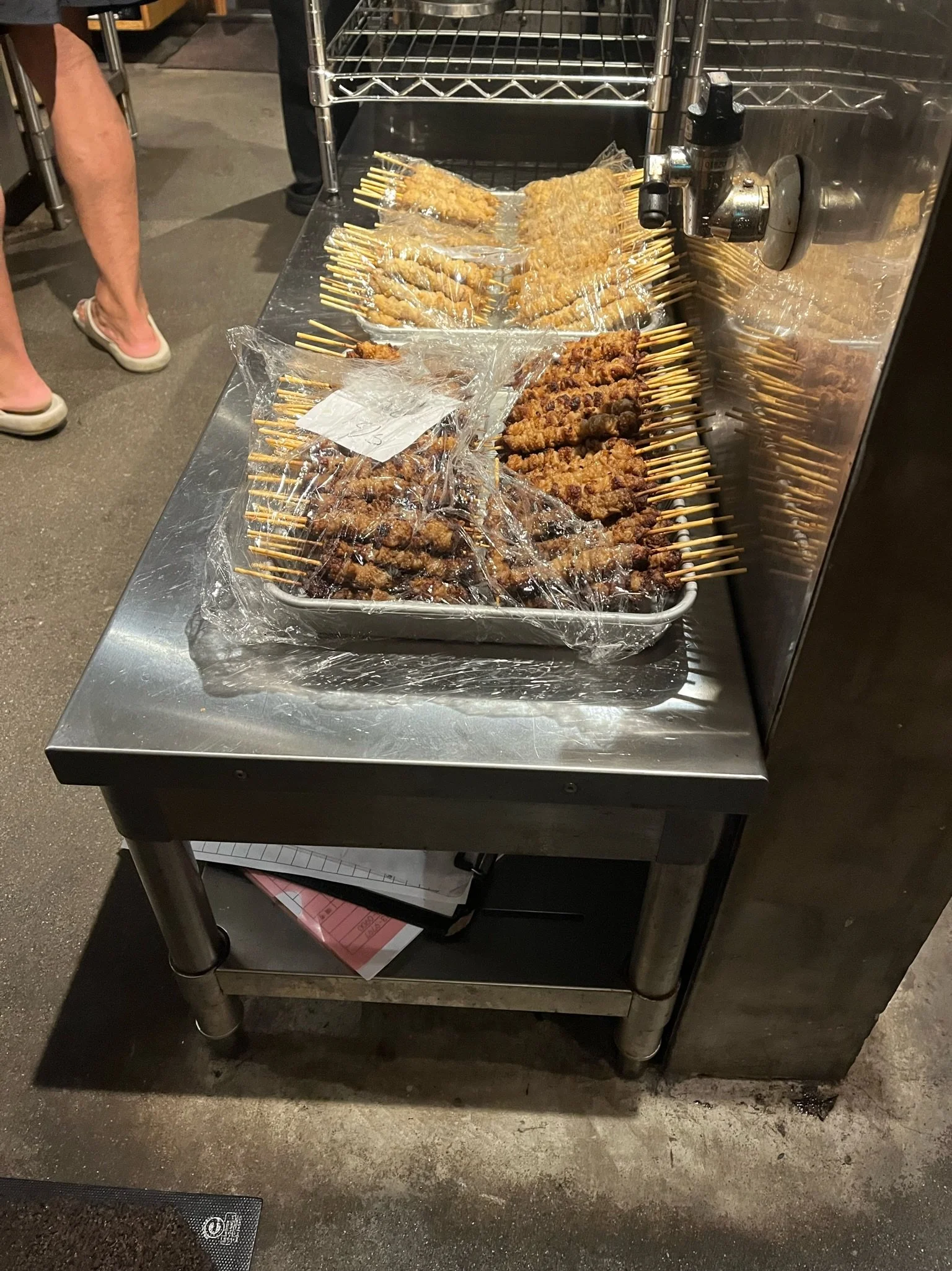 Fresh grilled yakitori skewers at an Okinawa izakaya