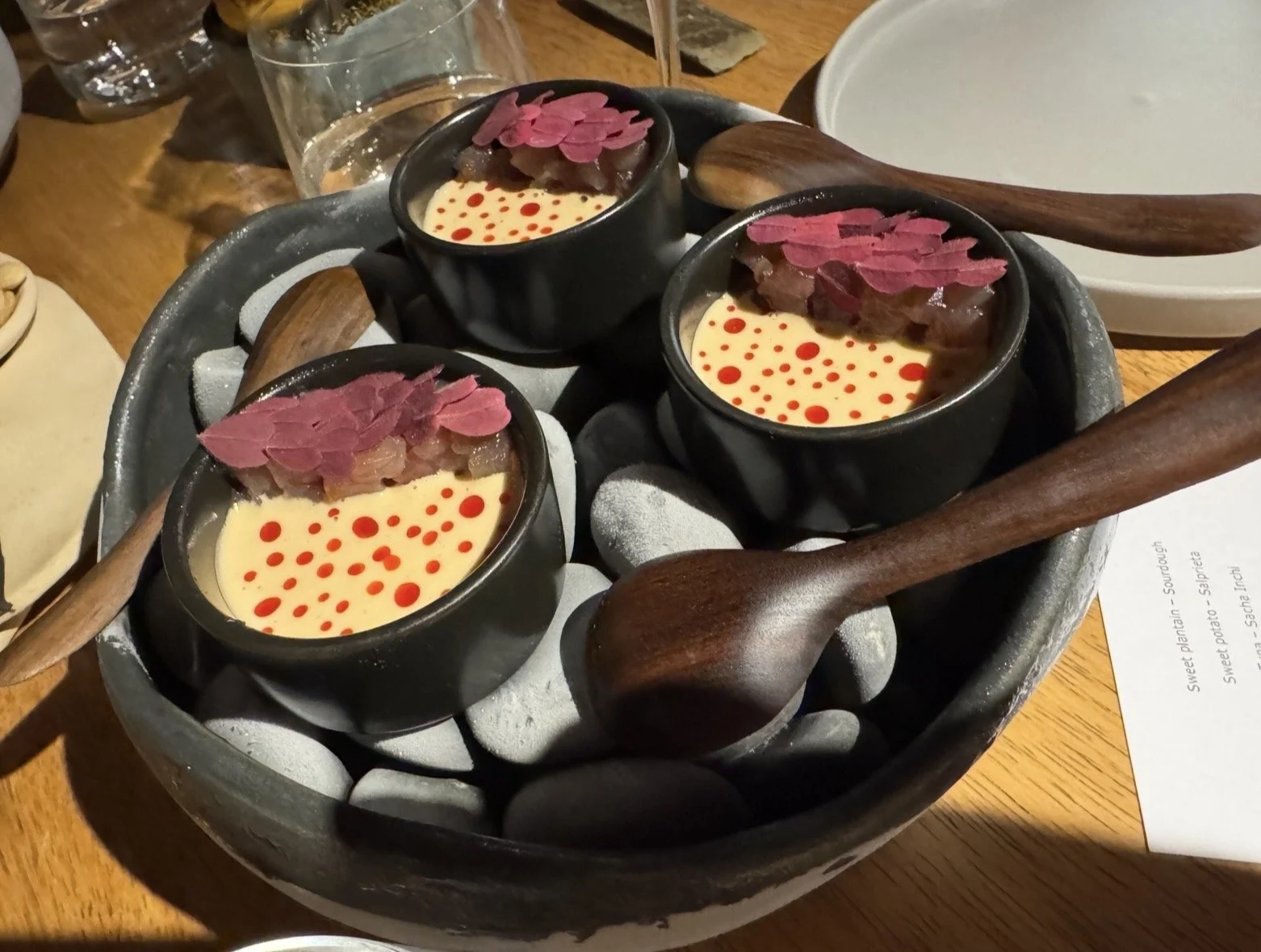 Creative tasting menu course at Nuema restaurant in Quito