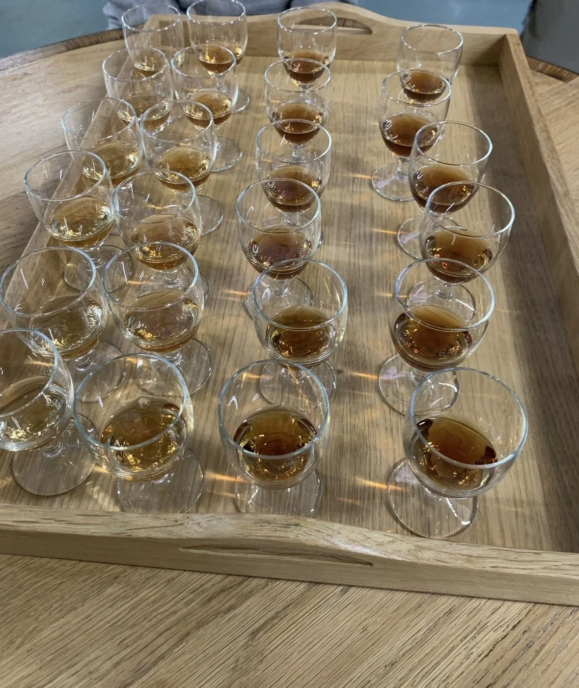 Madeira wine tasting flight featuring historic fortified wines at Henriques & Henriques winery.