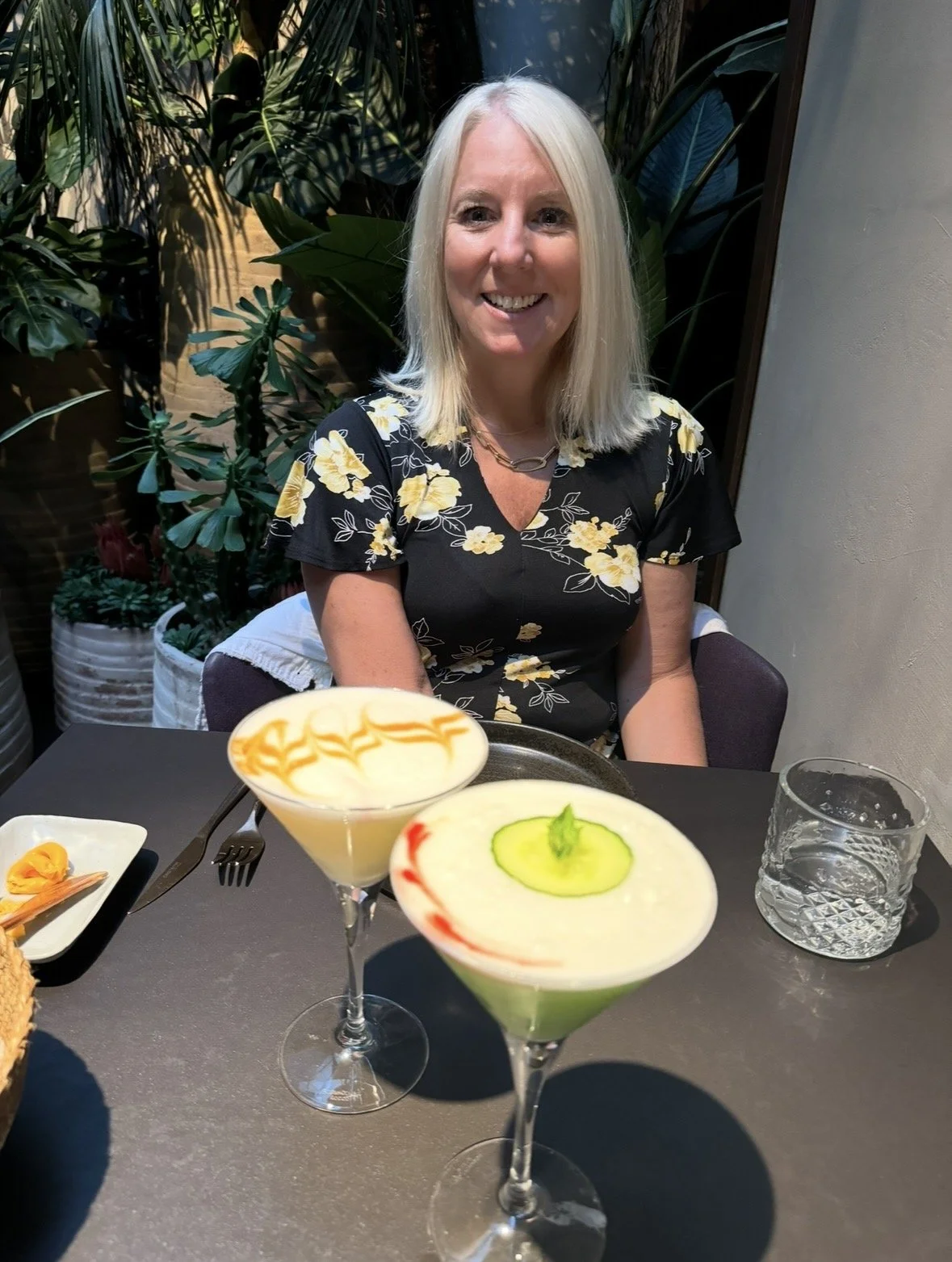 Craft cocktail at Quispe with citrus garnish
