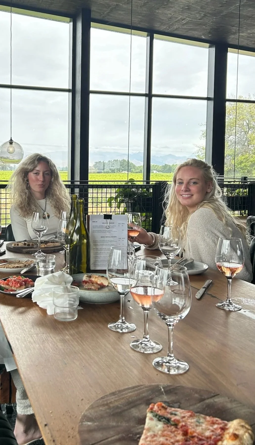 Lunch with Marlborough wines at Fancy Cow Restaurant overlooking vineyards in Blenheim, New Zealand.