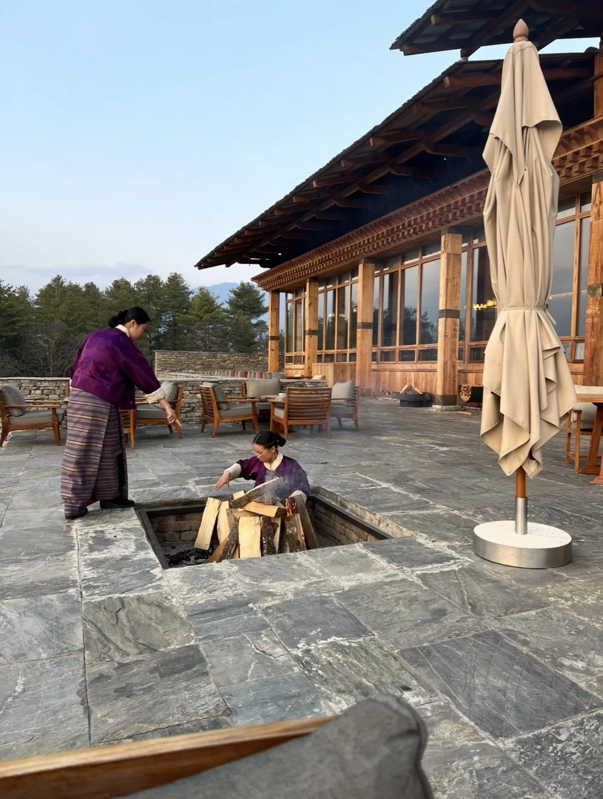 Outdoor fire pit at Six Senses Paro overlooking the mountains