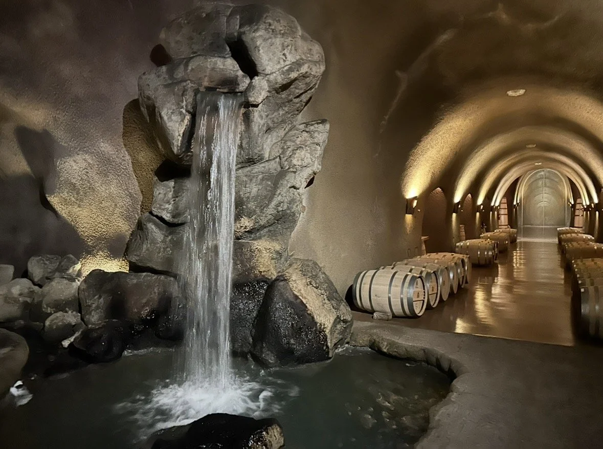 Underground waterfall inside Jarvis Estate winery cave in Napa Valley