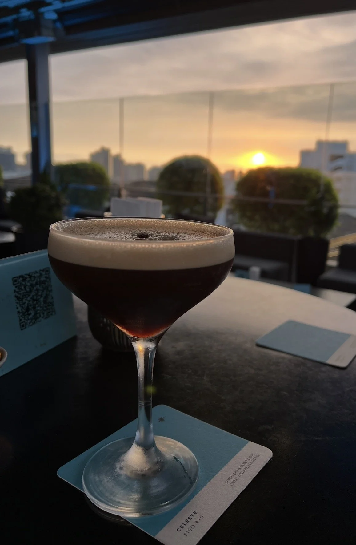 Rooftop cocktail with sunset views from Celeste Bar at Hyatt Centric San Isidro in Lima, Peru.