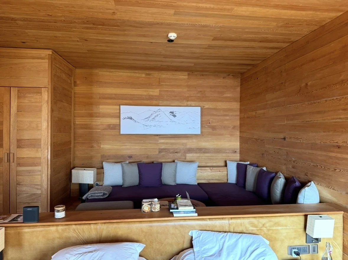 Wood-paneled guest room at Six Senses Gangtey in Bhutan