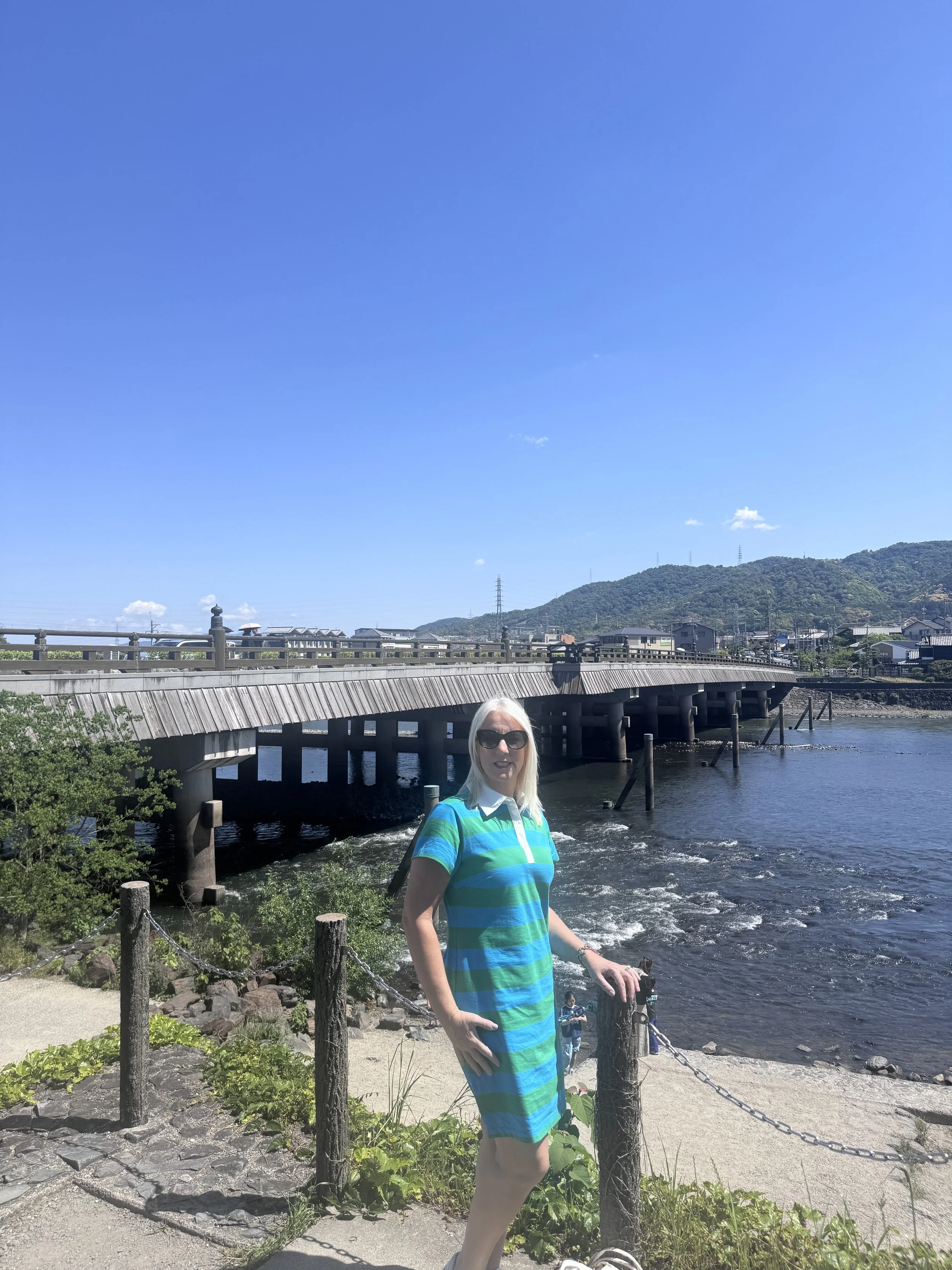 View of Uji River and historic Uji Bridge in Kyoto Prefecture