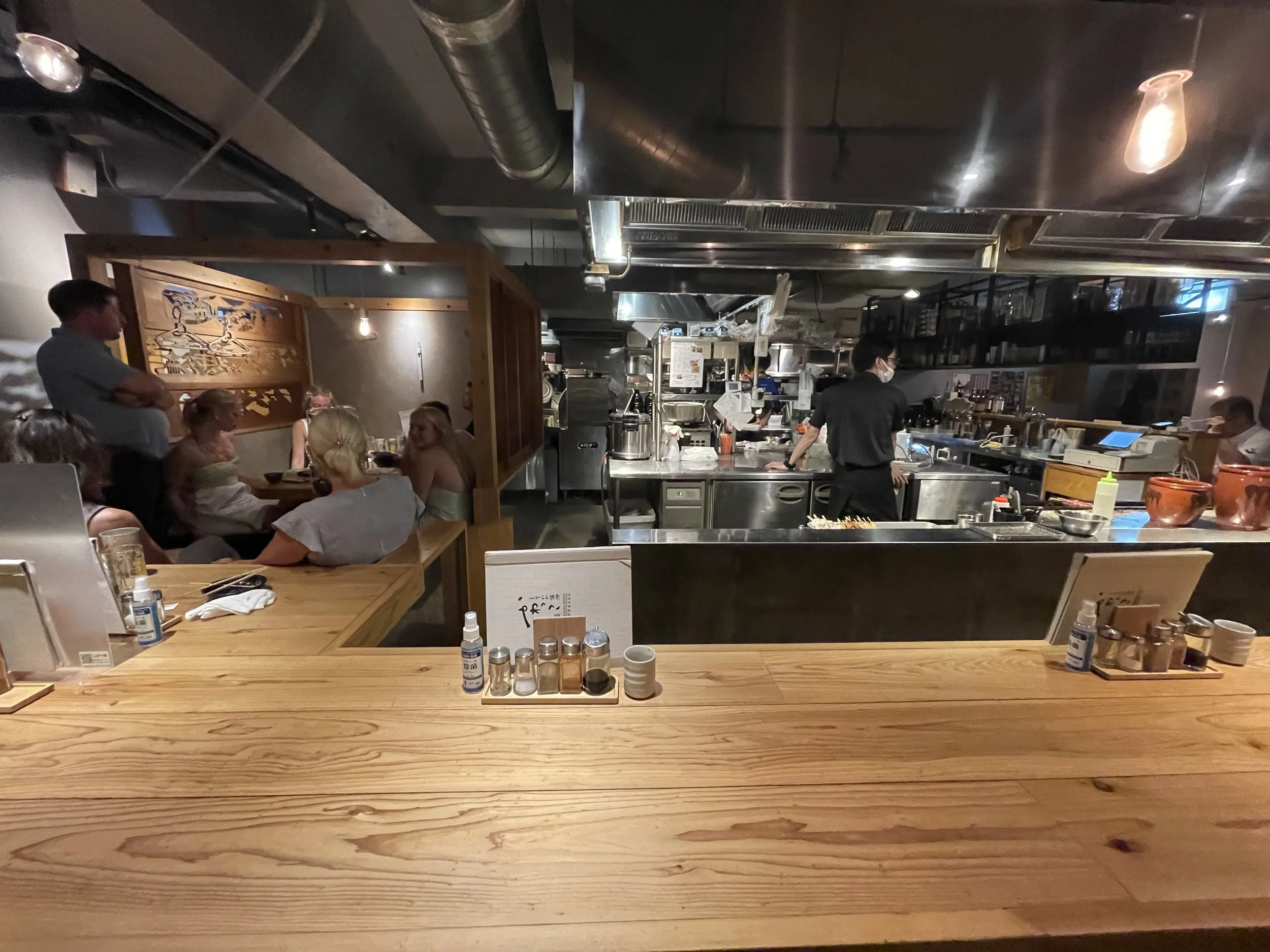 Open kitchen dining experience at a local Okinawa restaurant