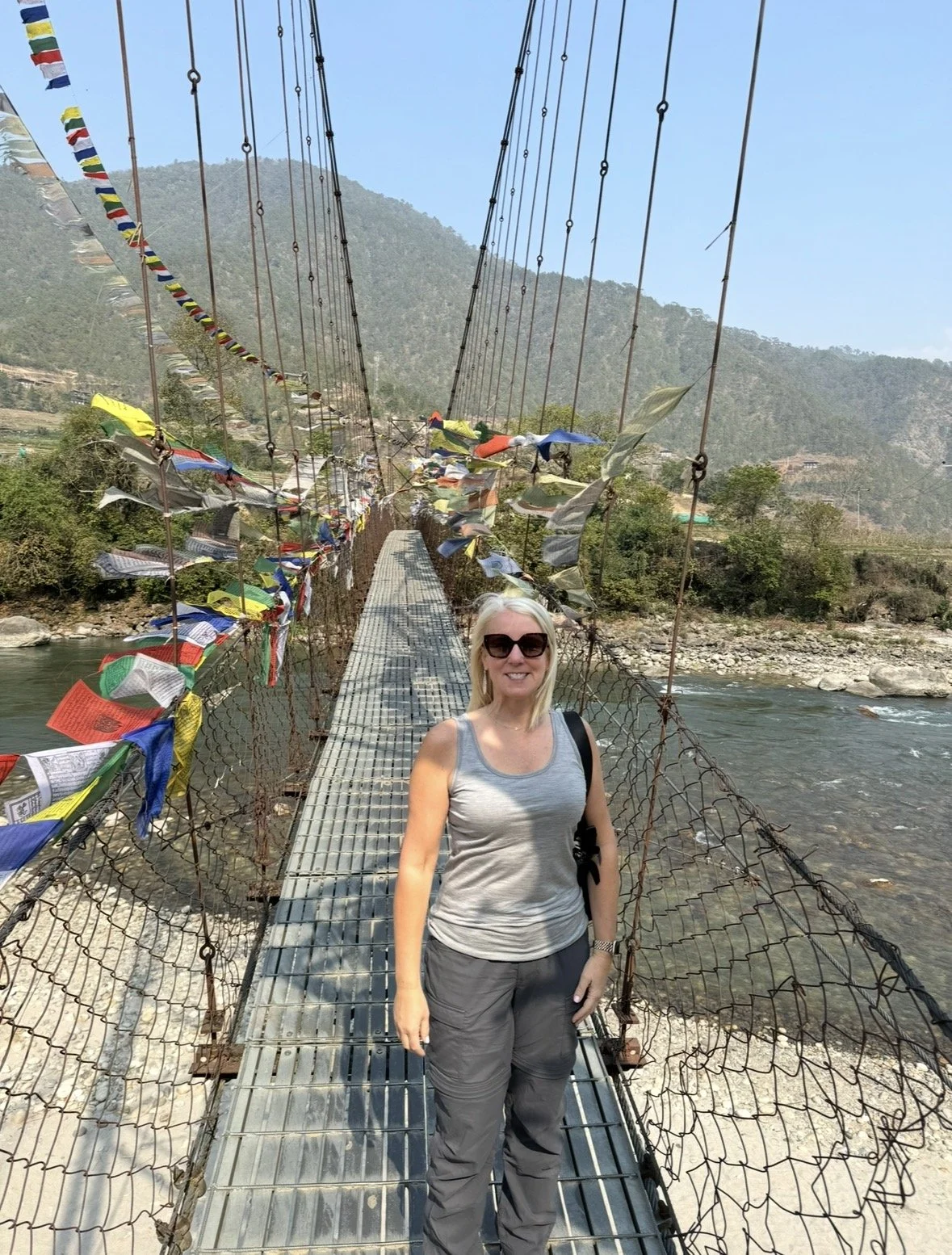 Crossing the suspension bridge near Punakha Dzong in Bhutan