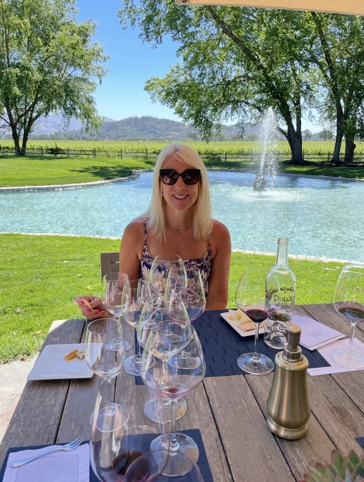 Outdoor wine tasting overlooking the gardens at Far Niente in Napa Valley