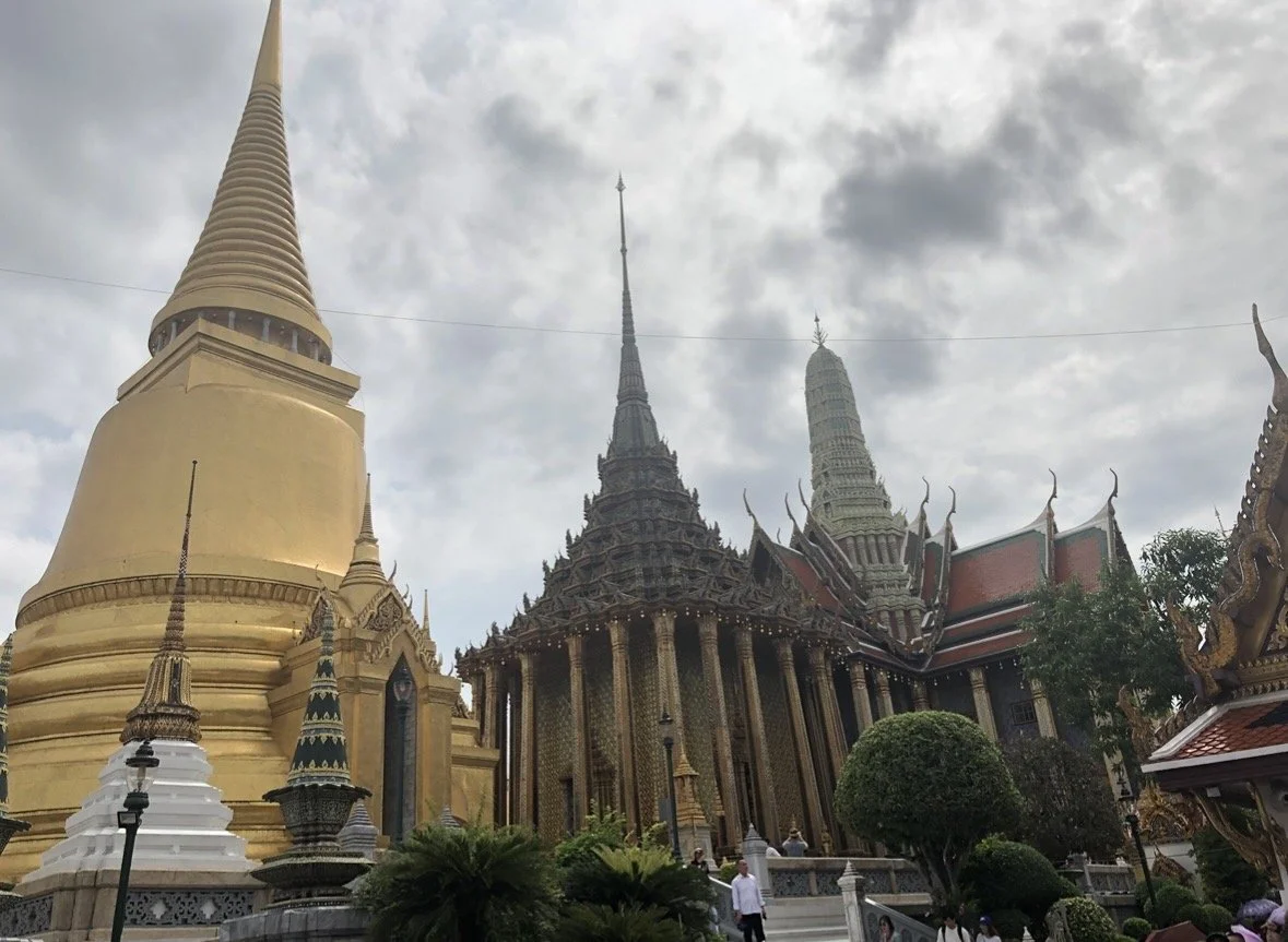 Golden chedi and temple buildings inside the Grand Palace Bangkok