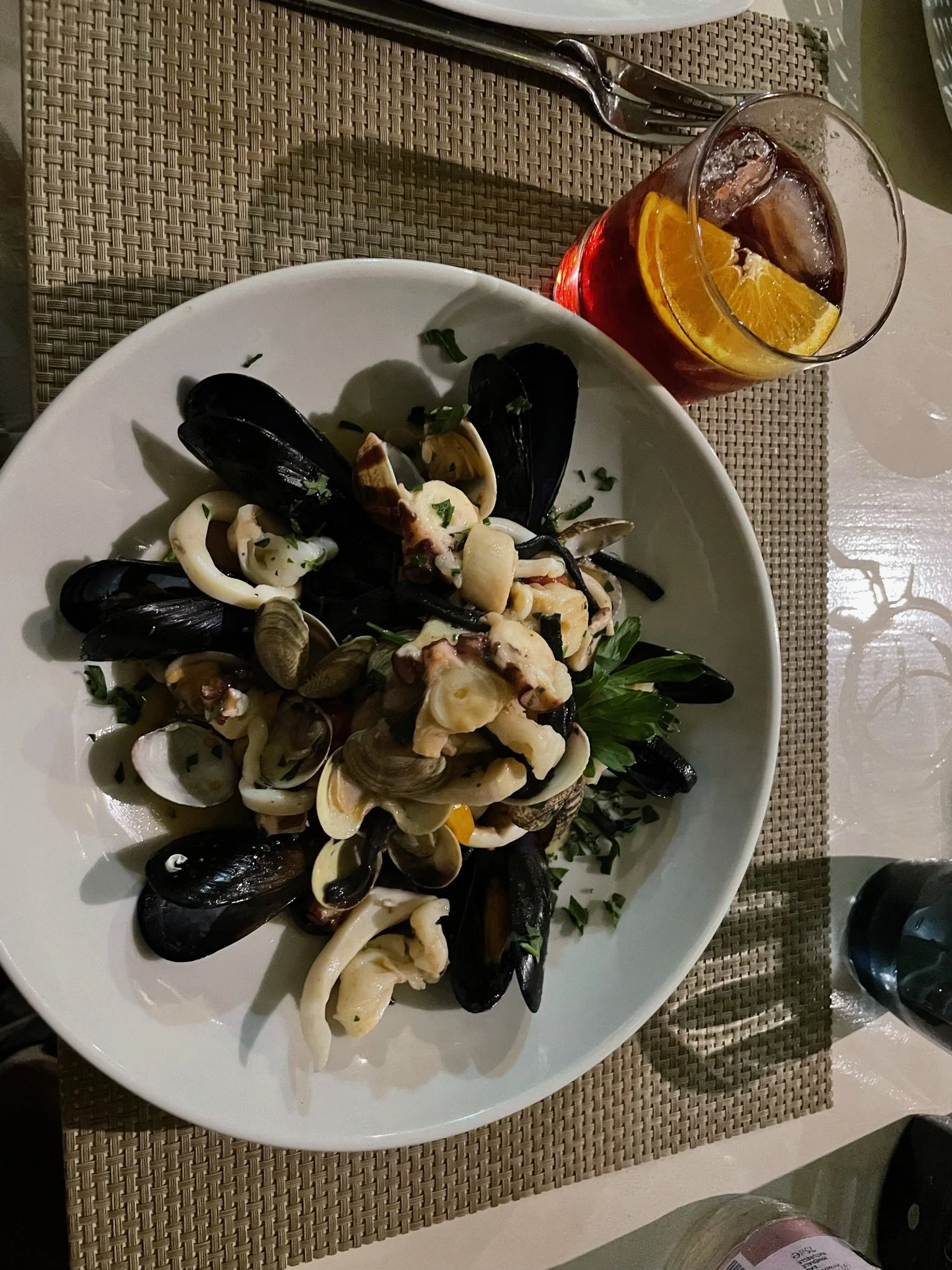 Seafood antipasto with mussels, calamari, octopus and clams at Trattoria dei Mori seafood restaurant in Sorrento, Italy