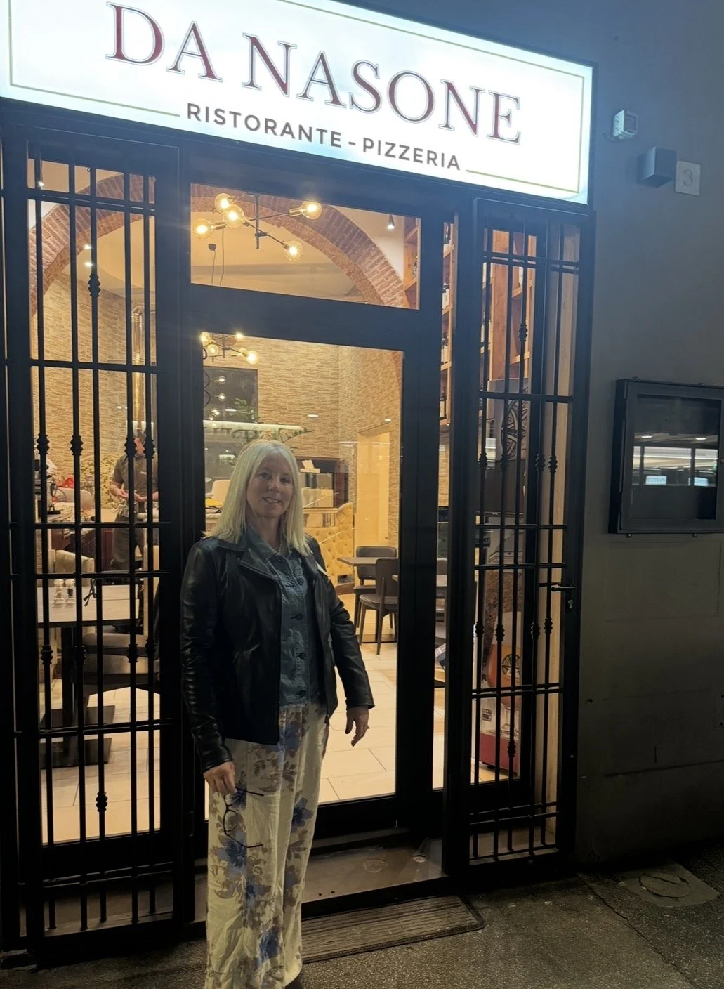 Entrance to Da Nasone restaurant in Florence, Italy
