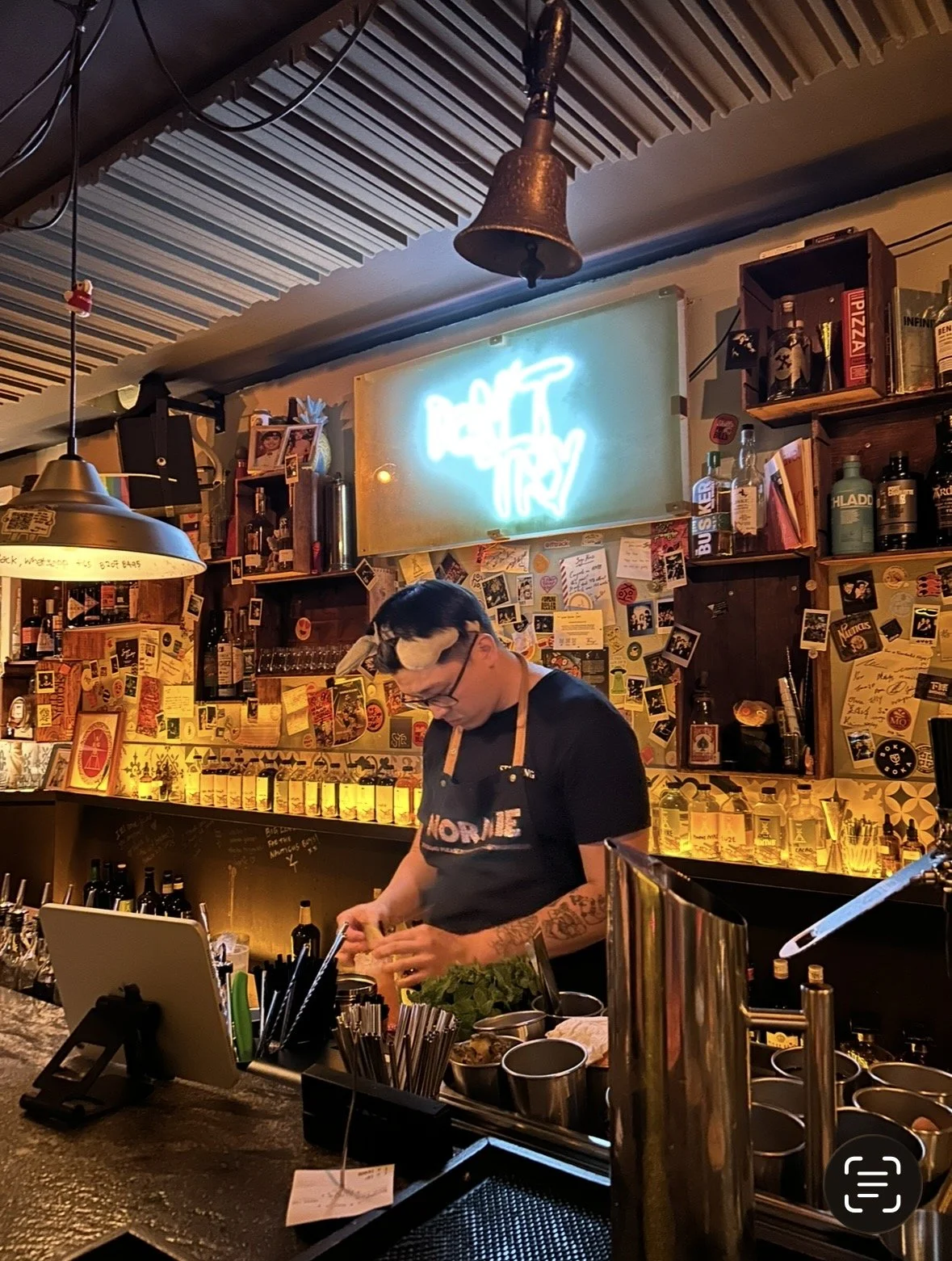 Bartender preparing cocktails at Sago House Singapore one of the city's best craft cocktail bars
